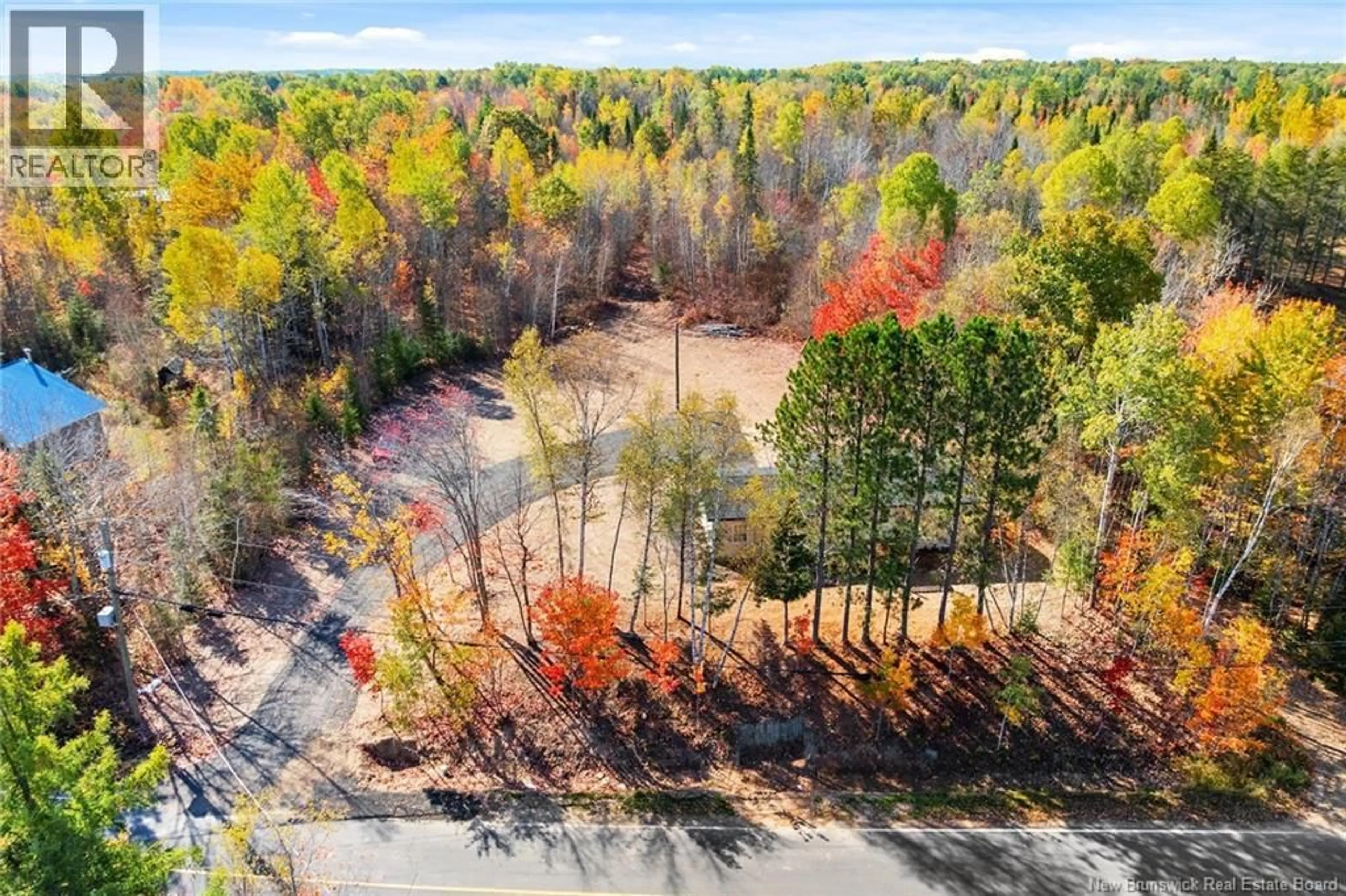 A pic from outside/outdoor area/front of a property/back of a property/a pic from drone, forest/trees view for 19 SLOPE ROAD, Minto New Brunswick E4B3G7
