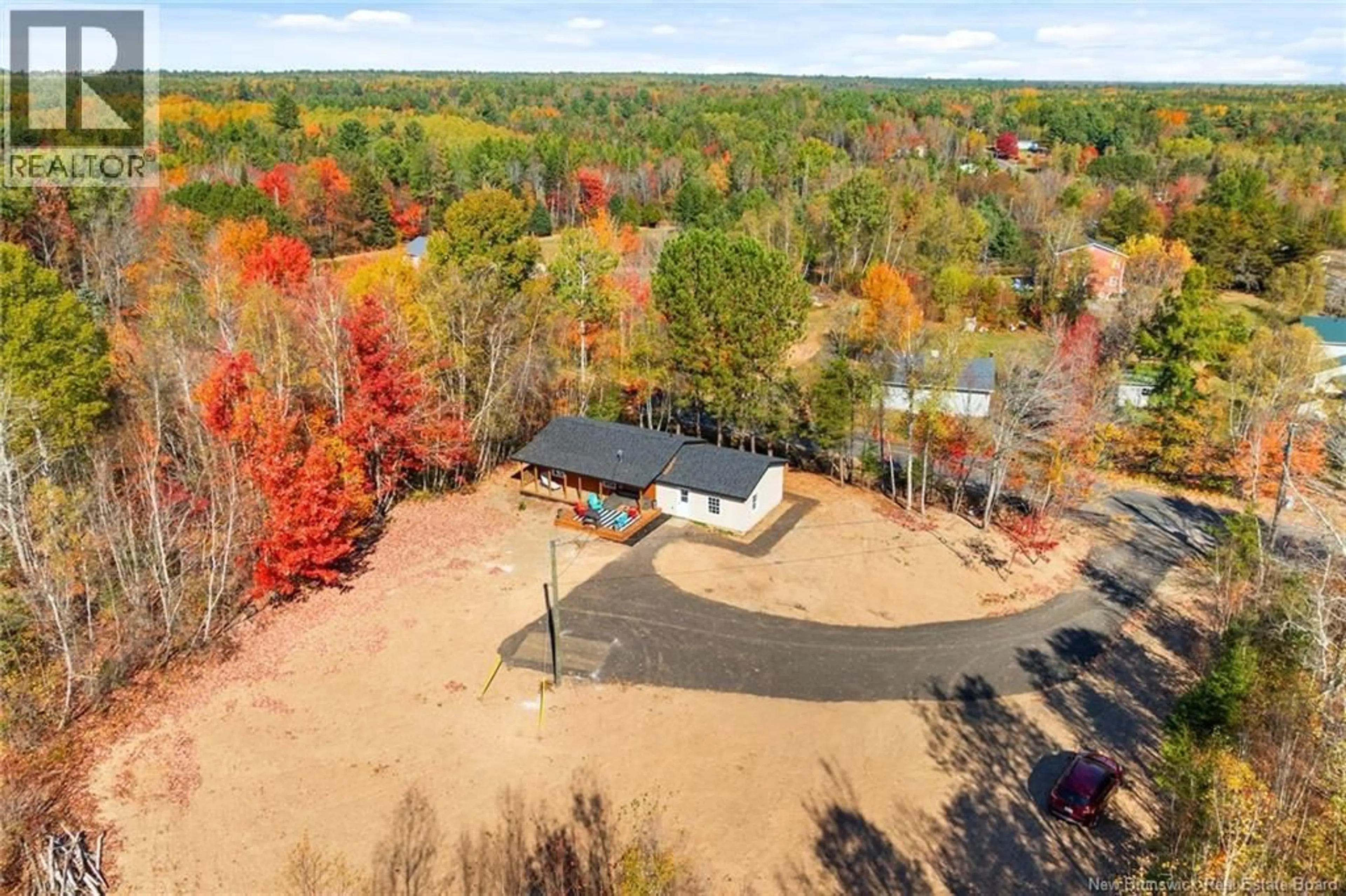 A pic from outside/outdoor area/front of a property/back of a property/a pic from drone, water/lake/river/ocean view for 19 SLOPE ROAD, Minto New Brunswick E4B3G7