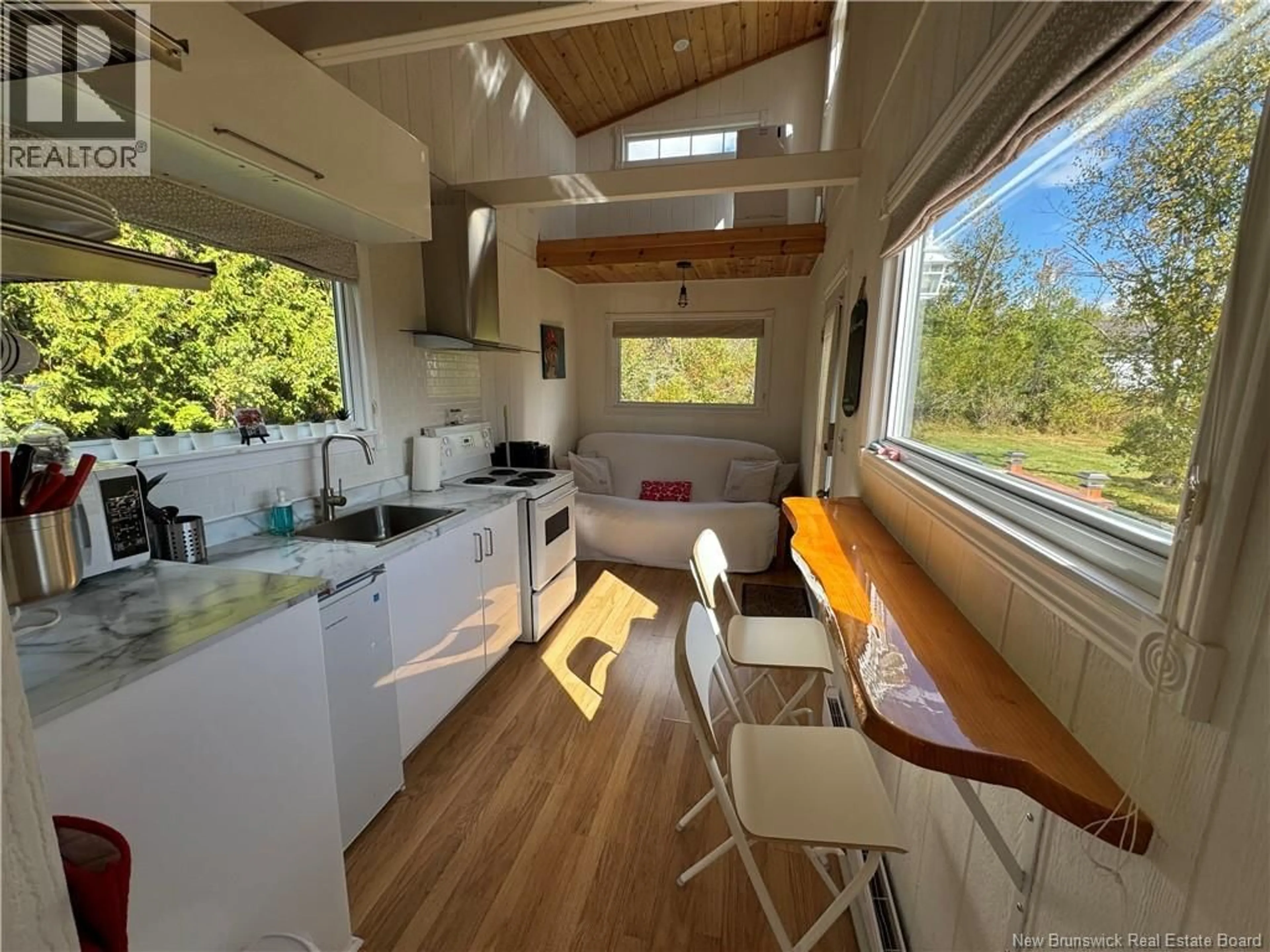 Open concept kitchen, wood/laminate floor for 3695 ROUTE 127, Bayside New Brunswick E5B2T1