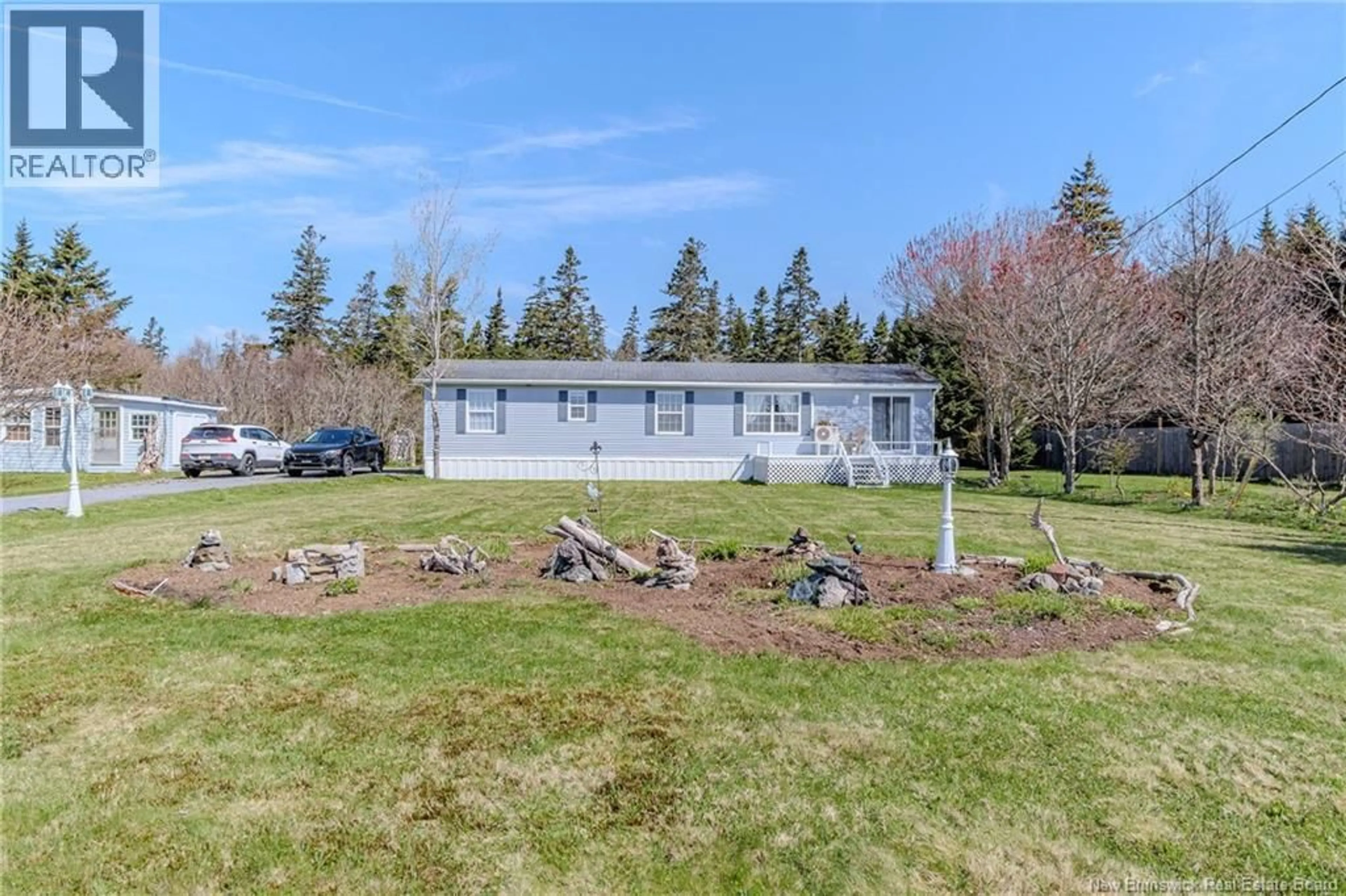 A pic from outside/outdoor area/front of a property/back of a property/a pic from drone, water/lake/river/ocean view for 35 LIGHTHOUSE ROAD, St. Martins New Brunswick E5R1M8