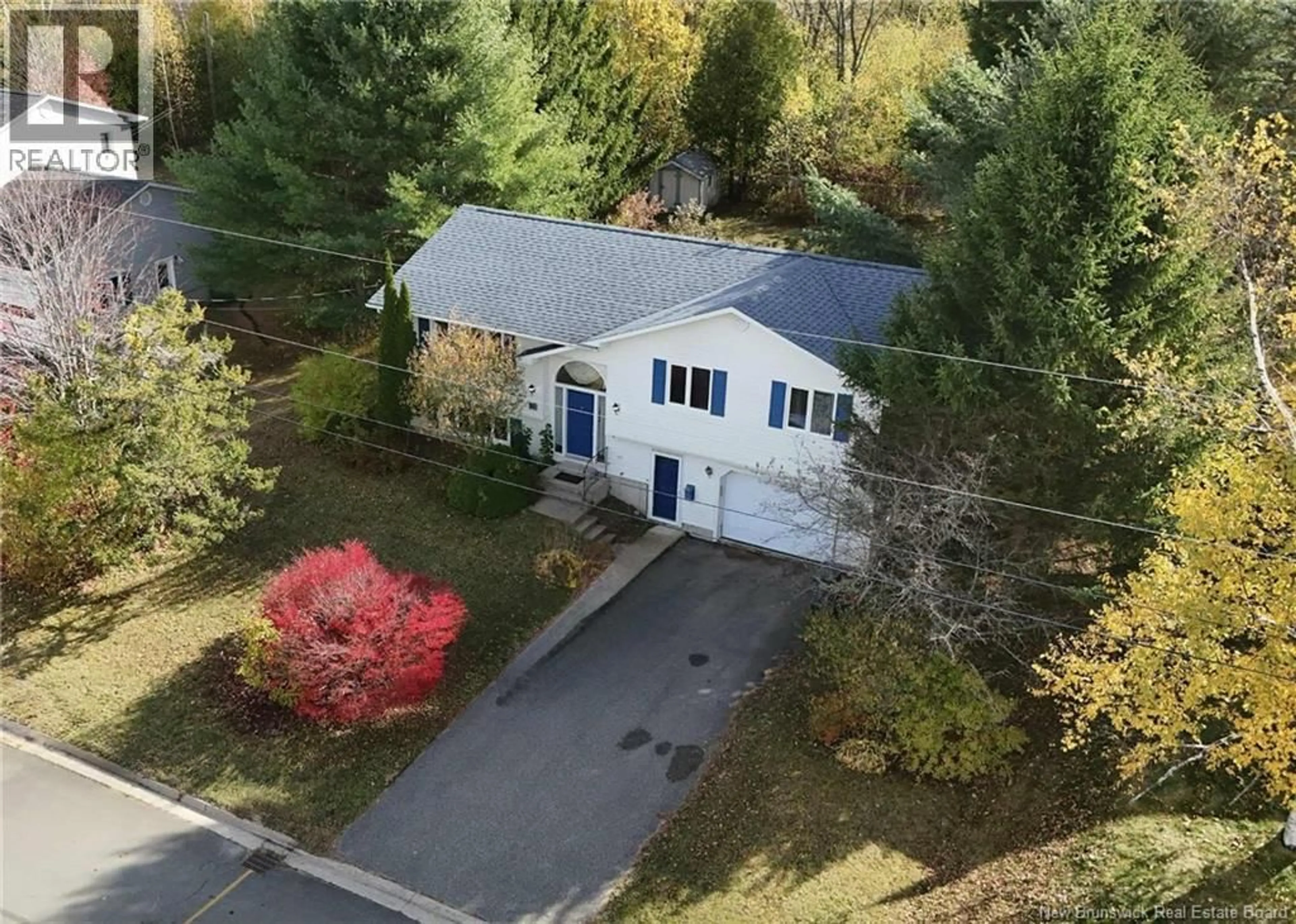 A pic from outside/outdoor area/front of a property/back of a property/a pic from drone, street for 23 NEWMAN STREET, New Maryland New Brunswick E3C1M3