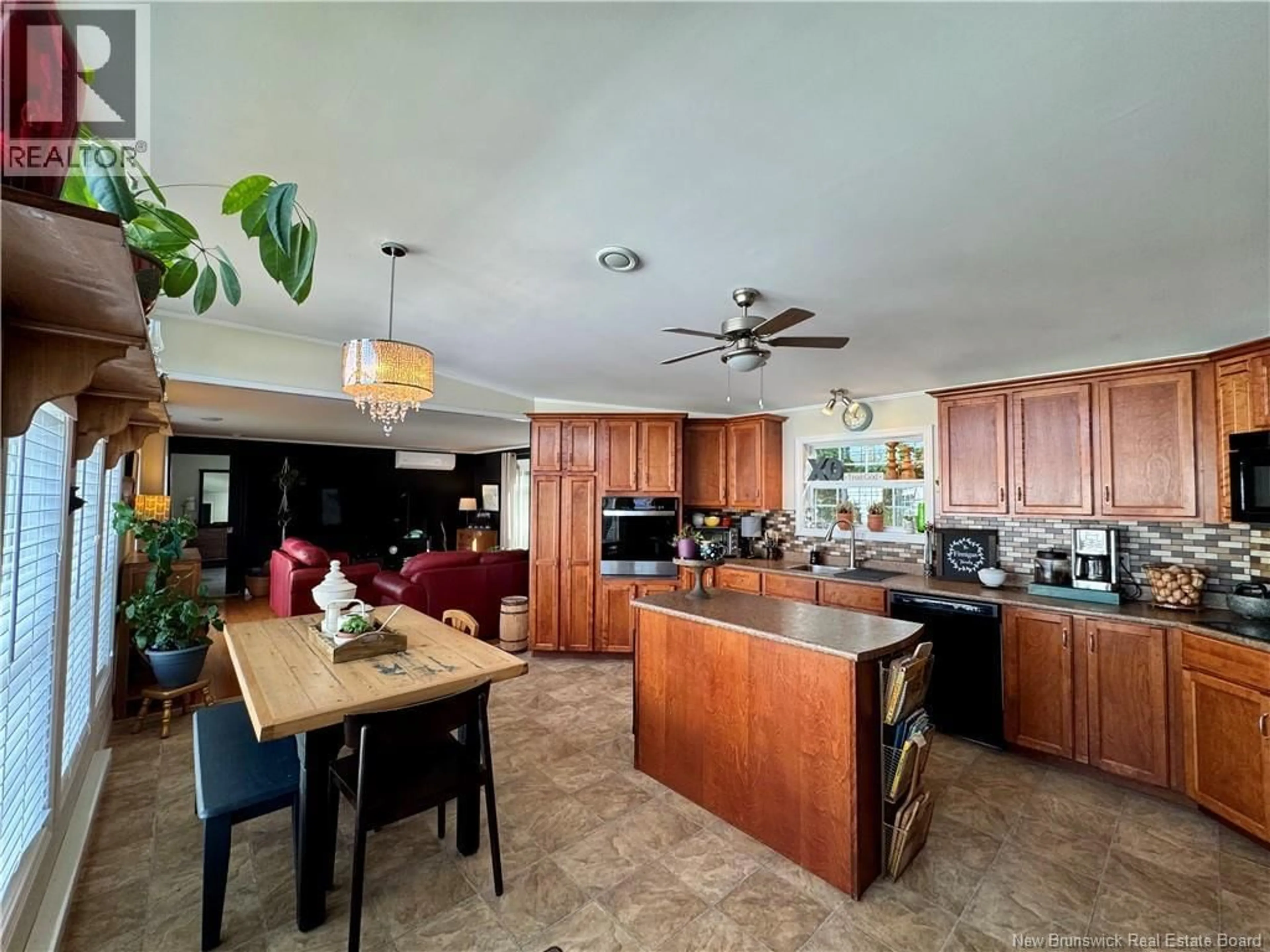 Open concept kitchen, ceramic/tile floor for 139A OAK LANE, Quispamsis New Brunswick E2G1T6