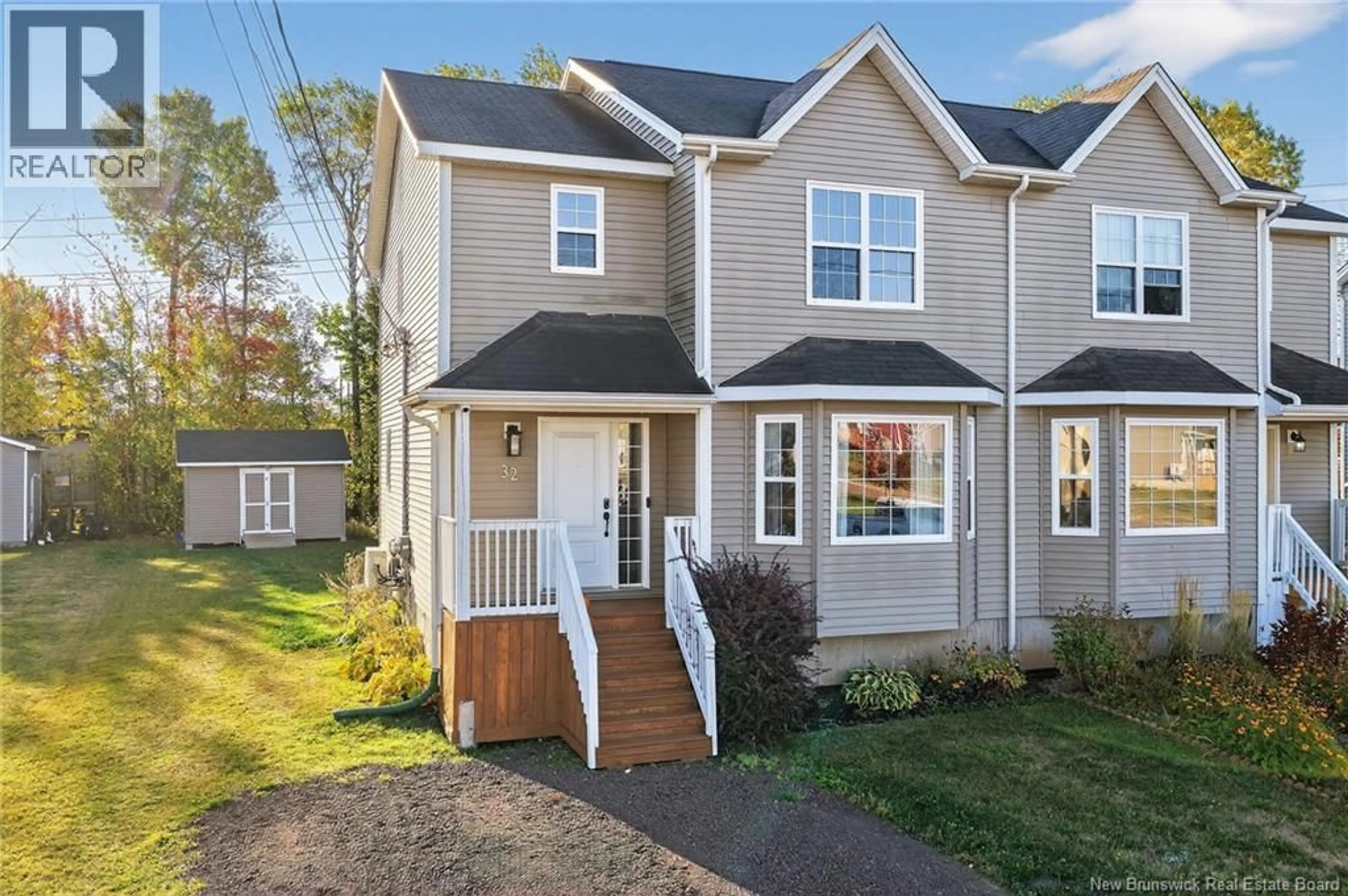 Home with vinyl exterior material, street for 32 HOLLAND DRIVE, Moncton New Brunswick E1G0X1