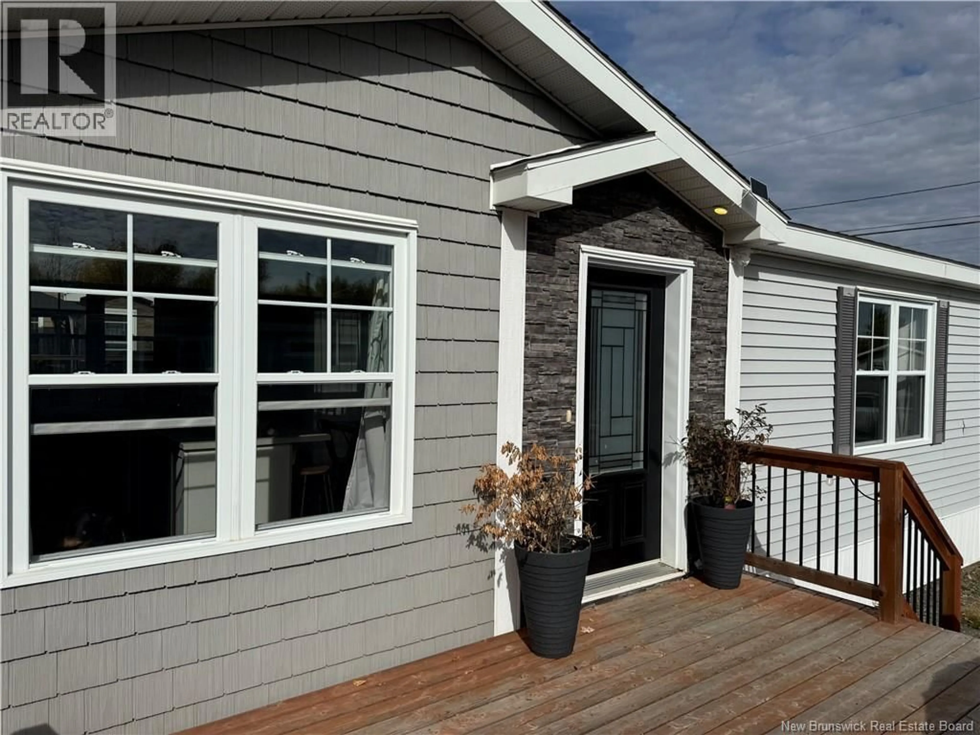 Home with vinyl exterior material, street for 28 OLIVIA STREET, Miramichi New Brunswick E1V0K5