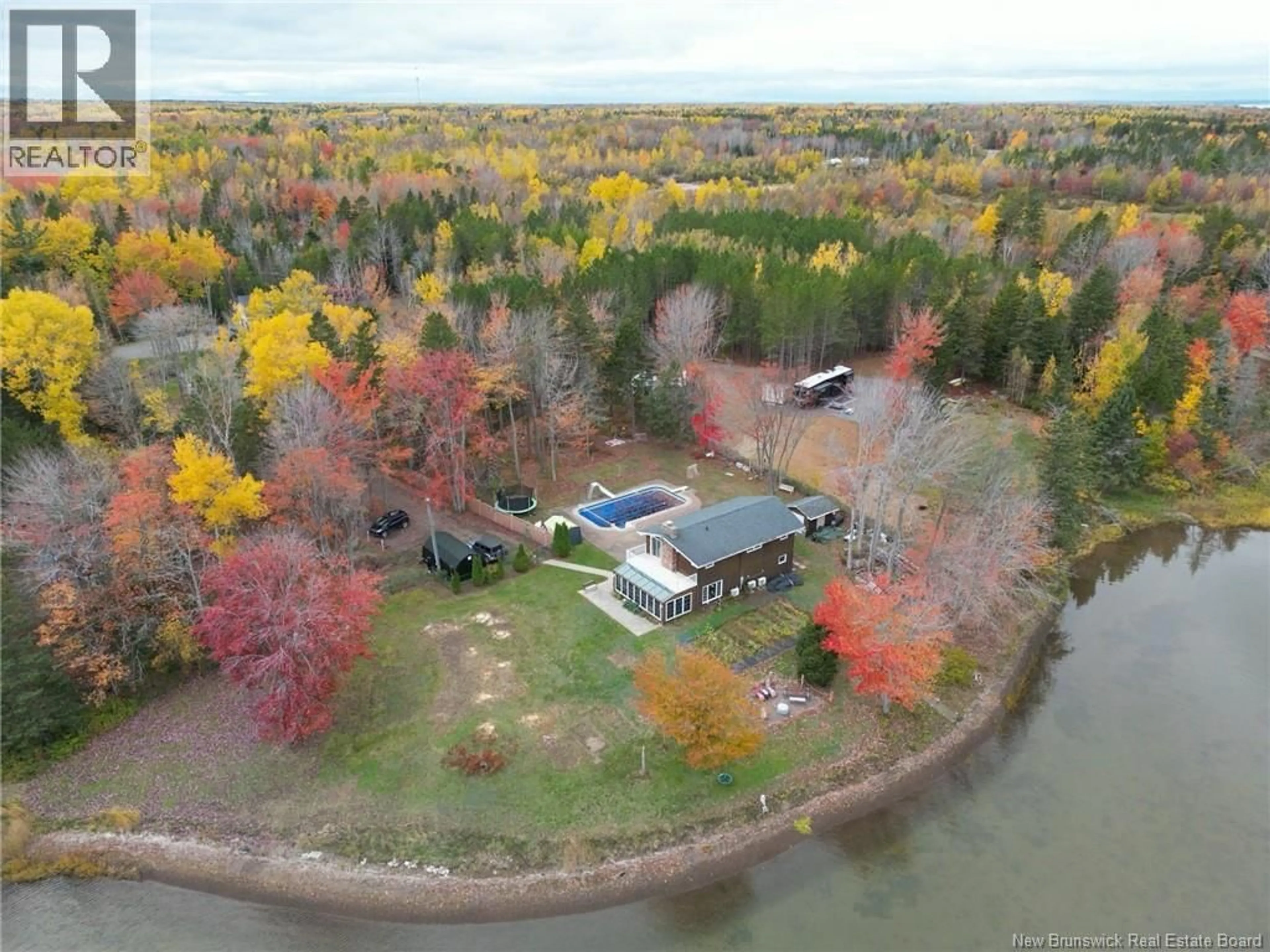 A pic from outside/outdoor area/front of a property/back of a property/a pic from drone, water/lake/river/ocean view for 74 SOLEIL, Grand-Barachois New Brunswick E4P8M3