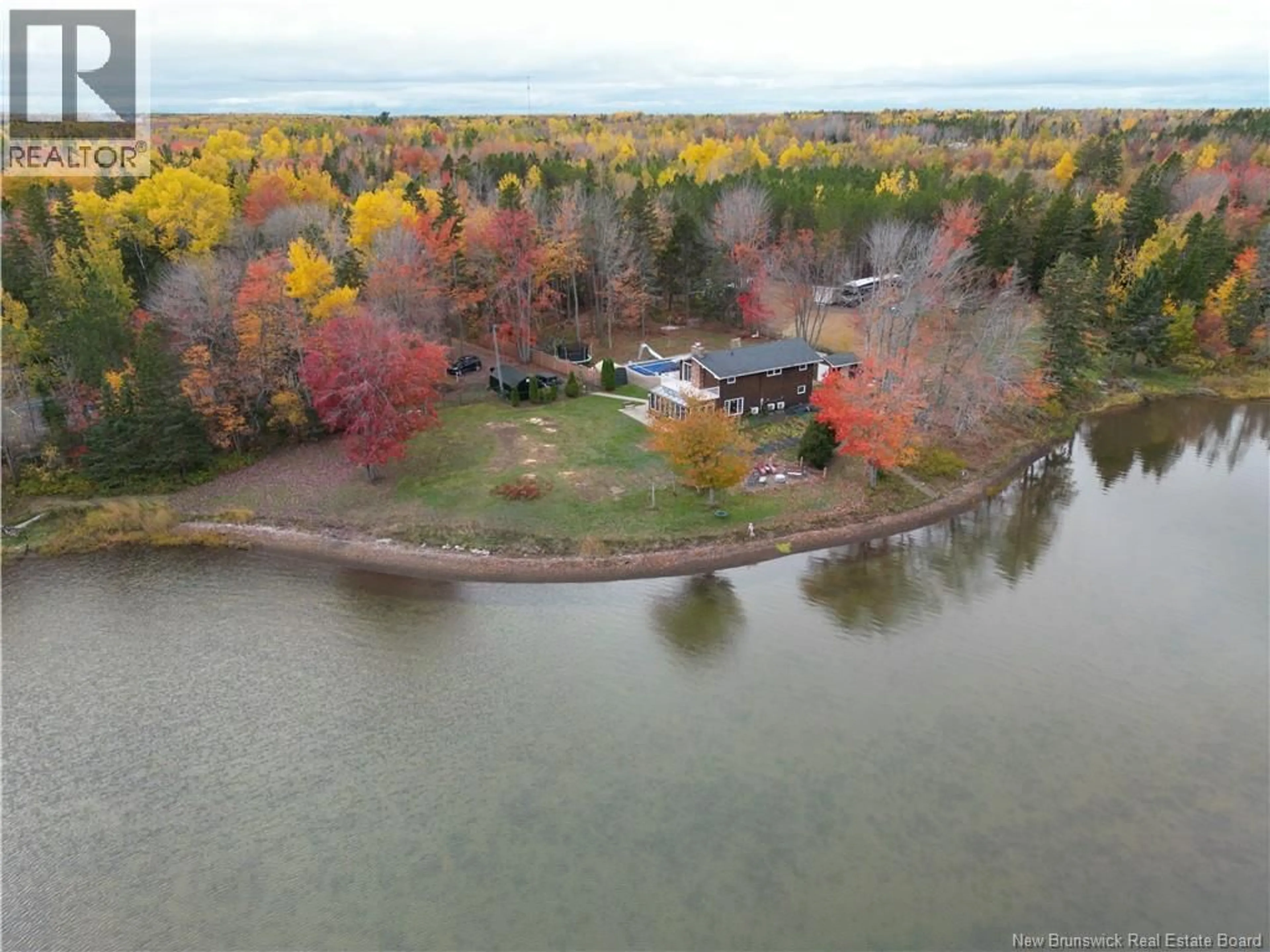 A pic from outside/outdoor area/front of a property/back of a property/a pic from drone, water/lake/river/ocean view for 74 SOLEIL, Grand-Barachois New Brunswick E4P8M3
