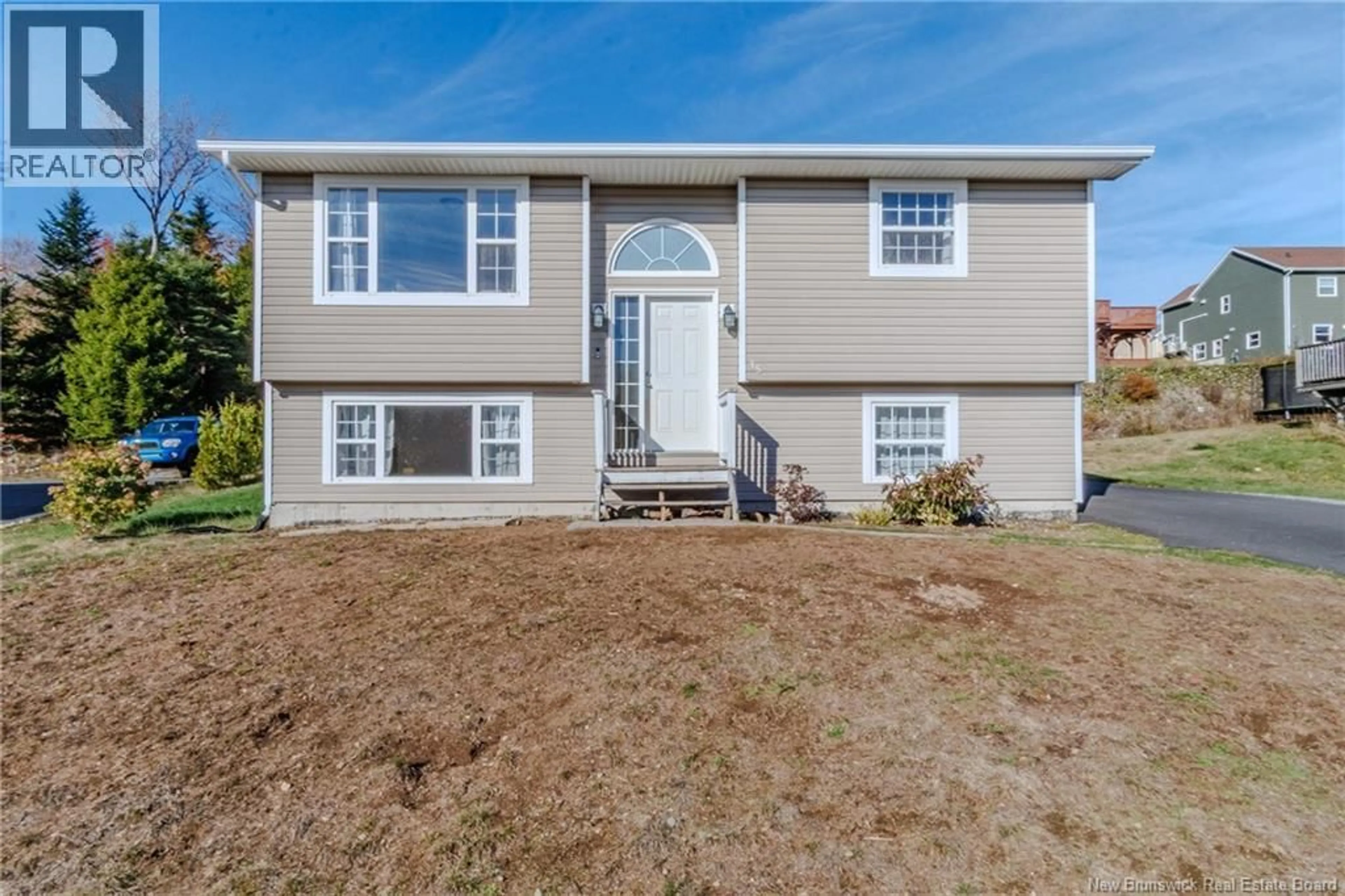 Home with vinyl exterior material, street for 15 DOLLY DRIVE, Saint John New Brunswick E2J0C9