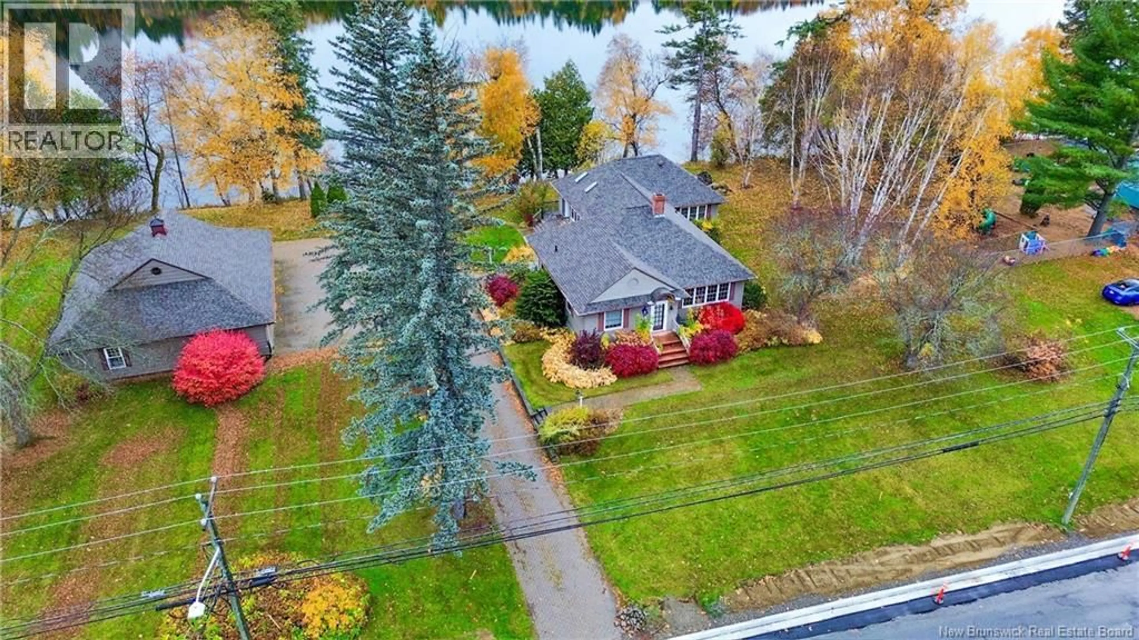 A pic from outside/outdoor area/front of a property/back of a property/a pic from drone, water/lake/river/ocean view for 535 EAST RIVERSIDE DRIVE, Perth-Andover New Brunswick E7H1Y4