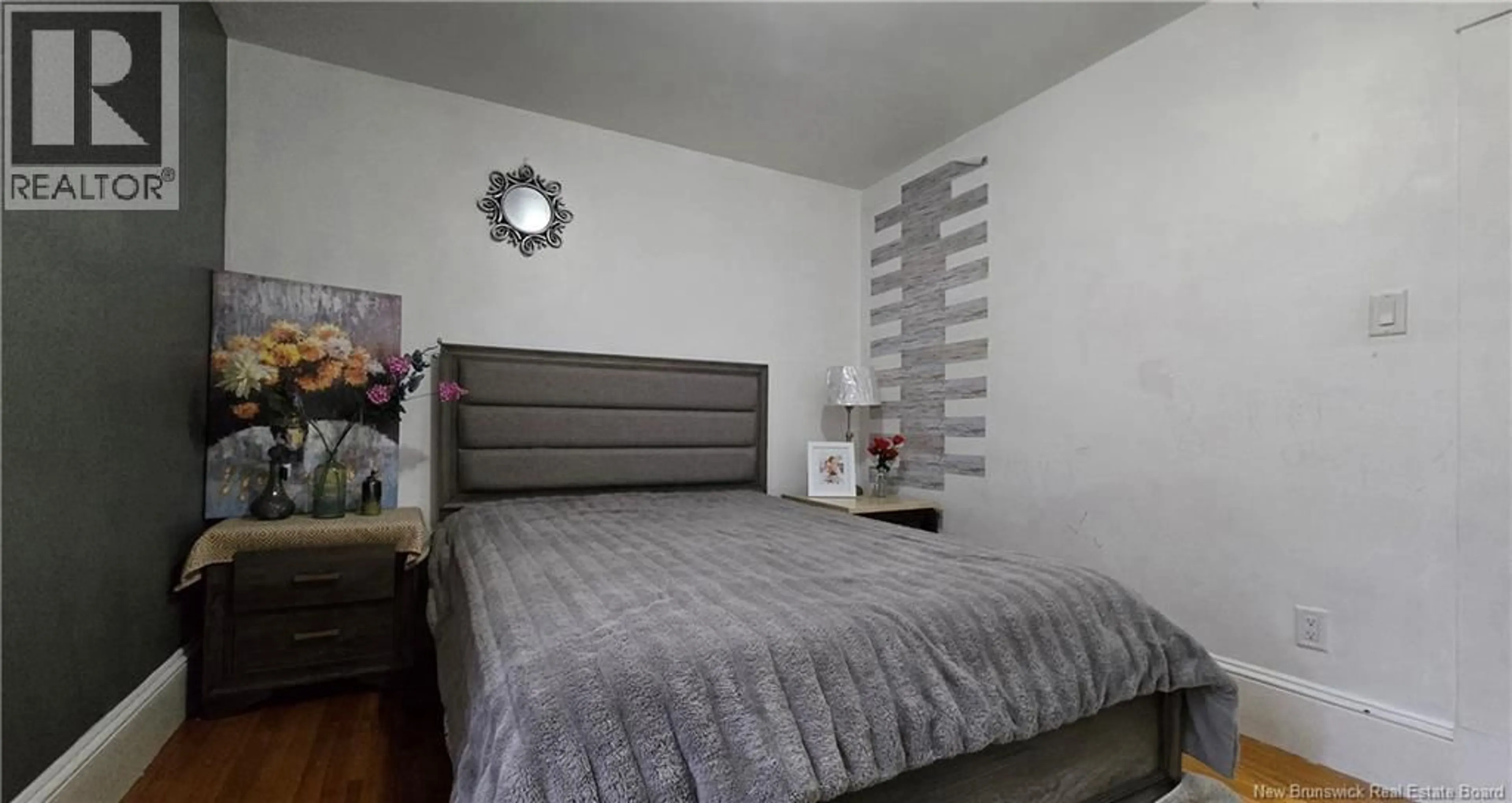 Bedroom with bed, wood/laminate floor for 13 GEORGE STREET, Campbellton New Brunswick E3N2Z6