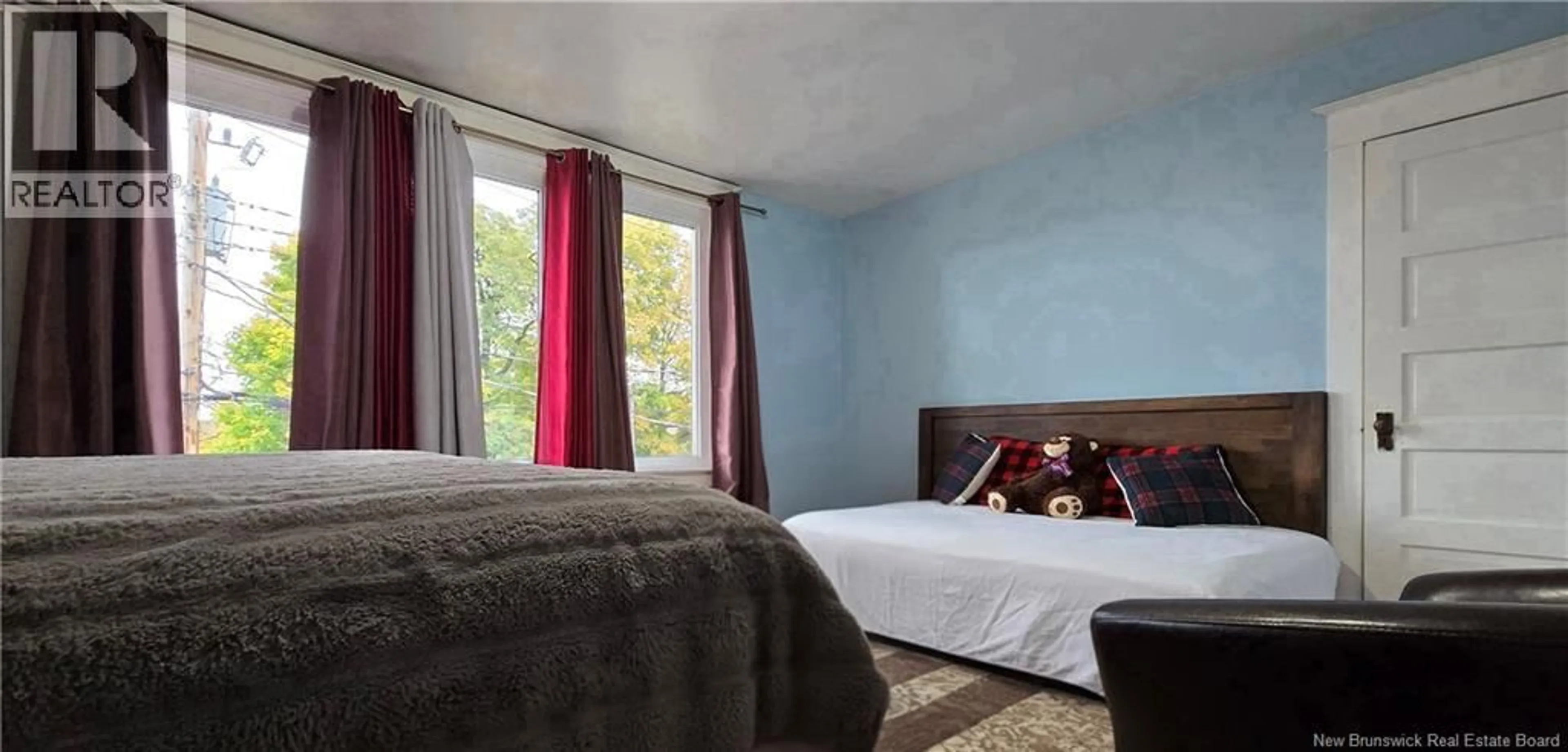 Bedroom with bed, wood/laminate floor for 13 GEORGE STREET, Campbellton New Brunswick E3N2Z6