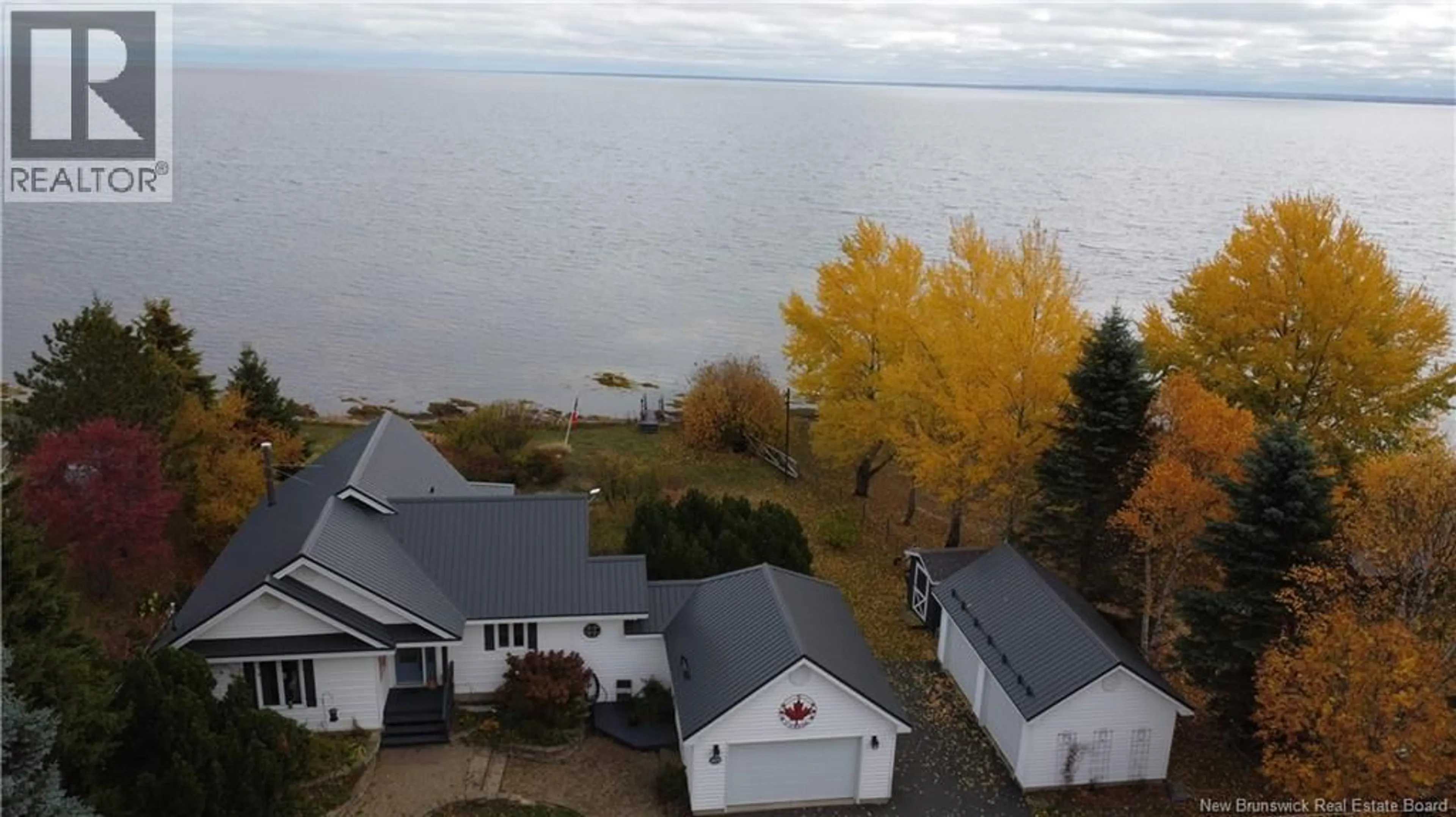 A pic from outside/outdoor area/front of a property/back of a property/a pic from drone, water/lake/river/ocean view for 425 DE LA BAIE, Nigadoo New Brunswick E8K3P8