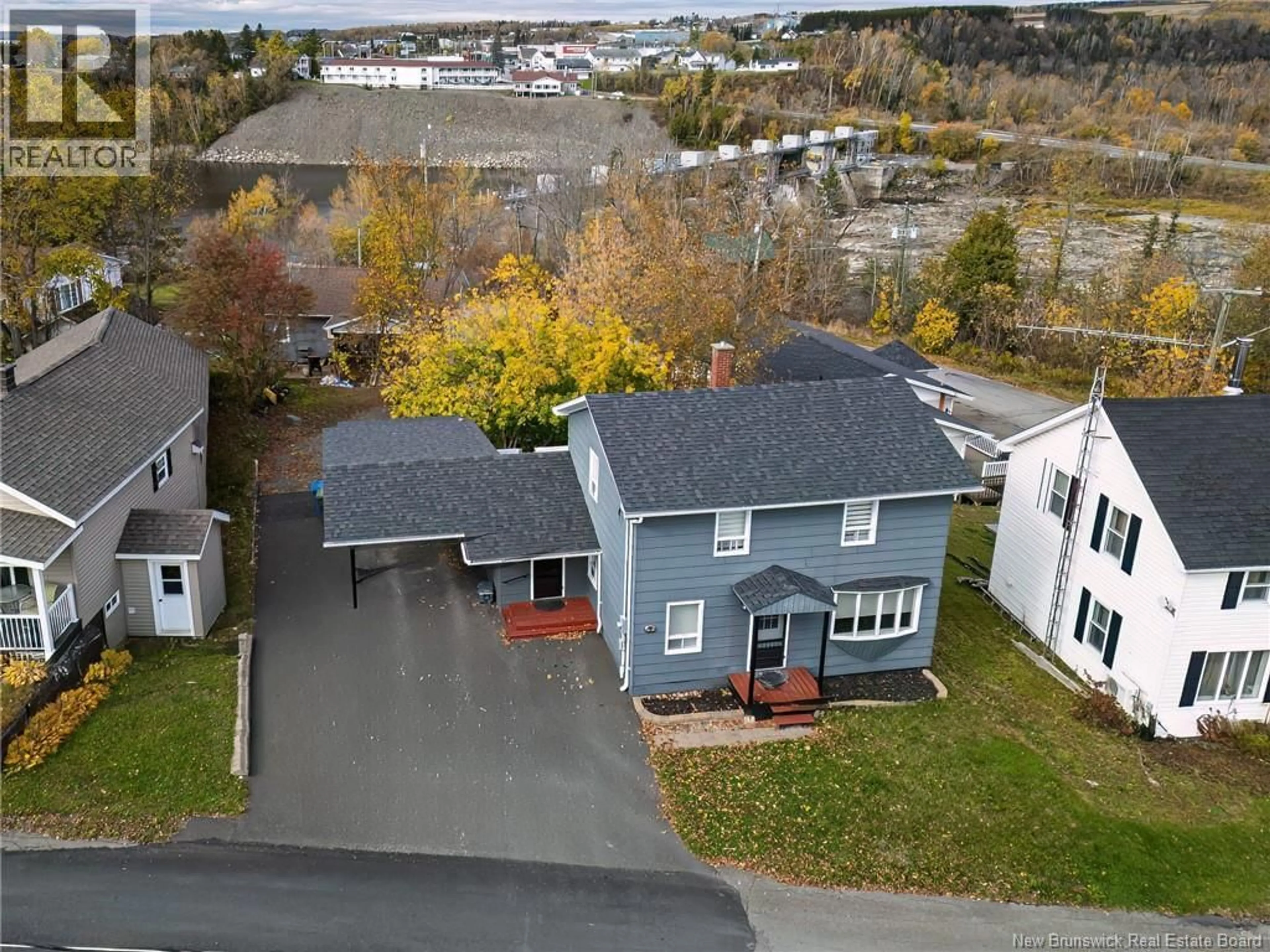 A pic from outside/outdoor area/front of a property/back of a property/a pic from drone, street for 136 FRONT STREET, Grand Falls New Brunswick E3Z2S6
