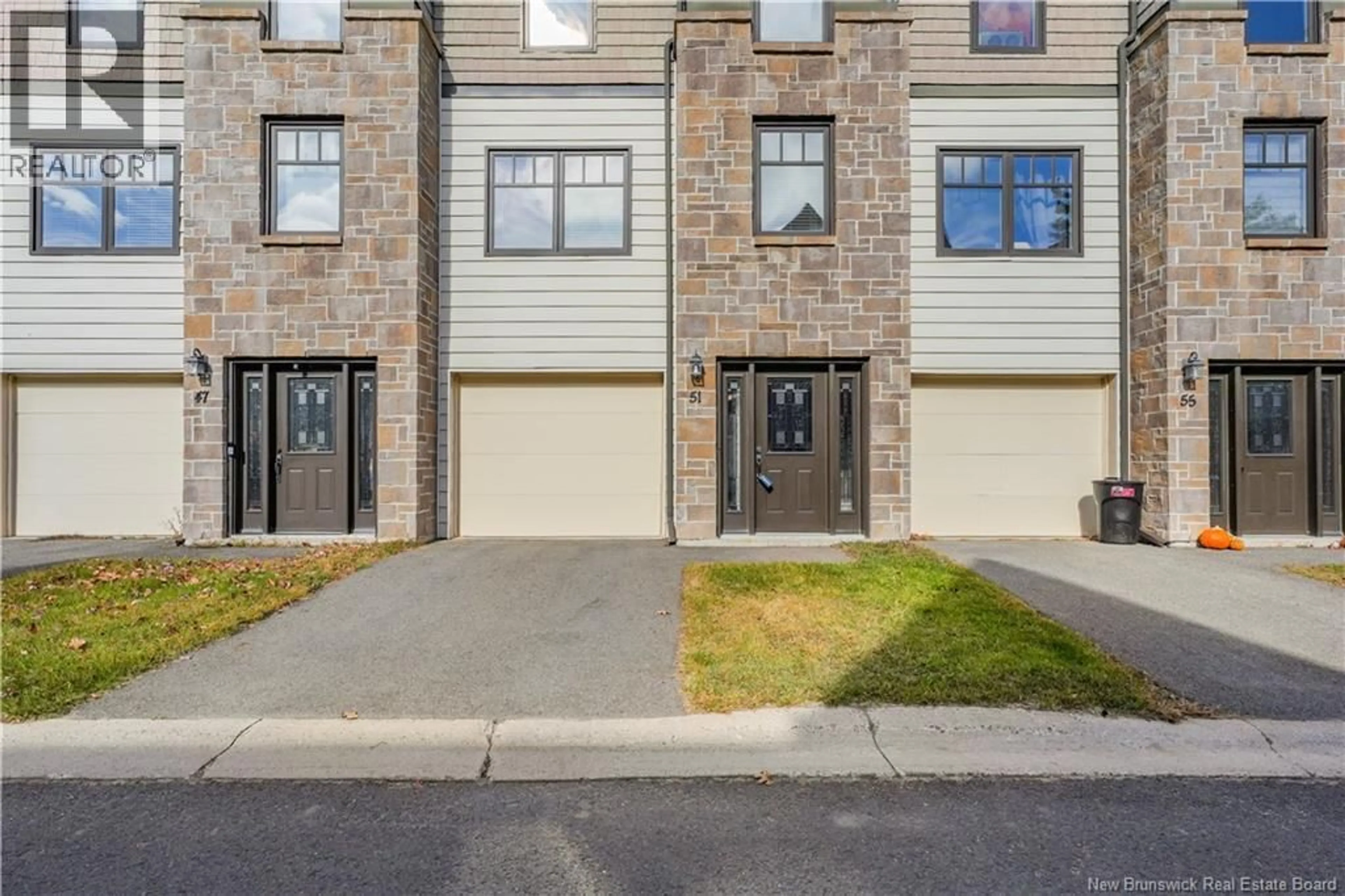 A pic from outside/outdoor area/front of a property/back of a property/a pic from drone, street for 51 BROWNSTONE LANE, Fredericton New Brunswick E3A7M4