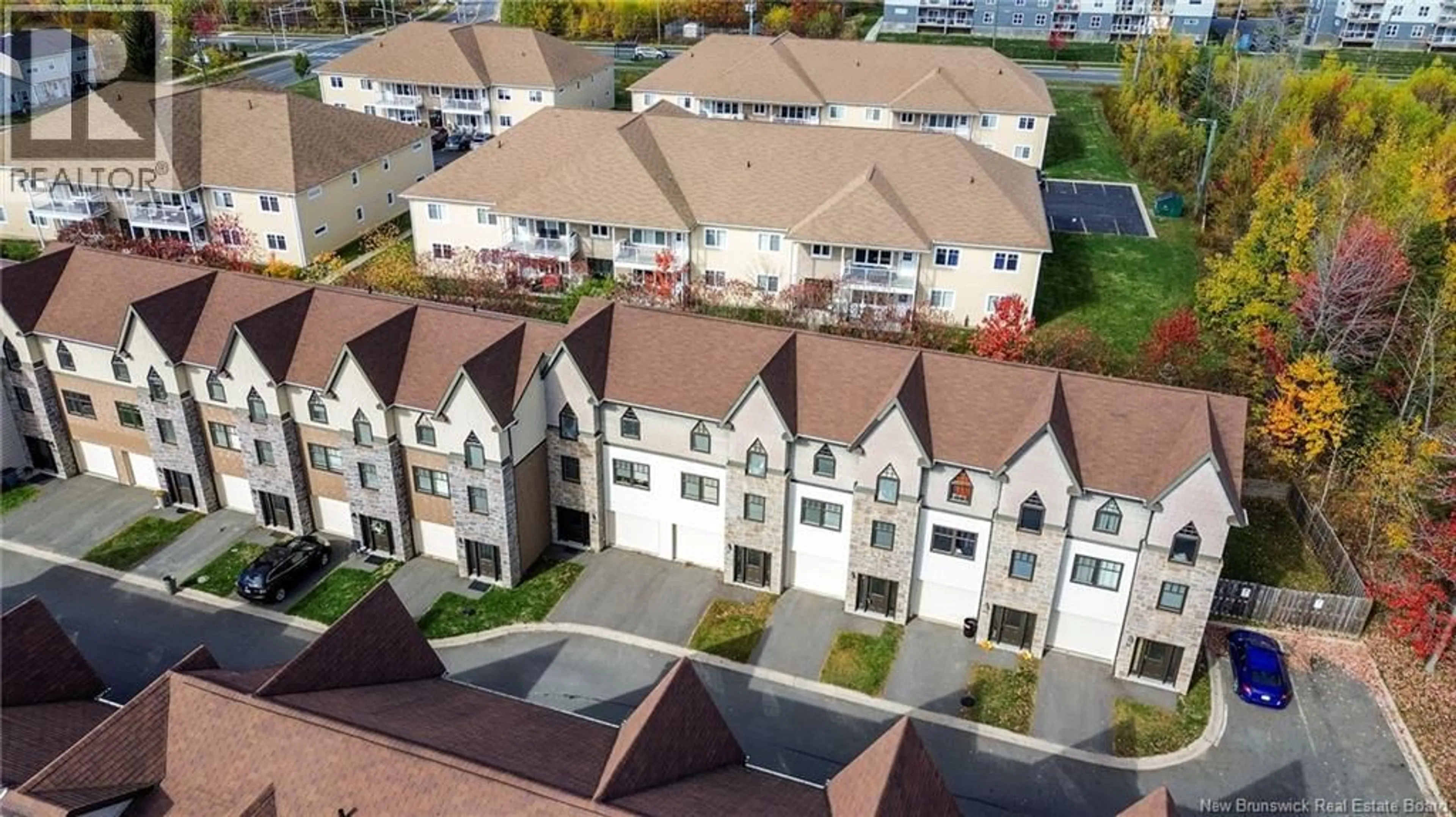 A pic from outside/outdoor area/front of a property/back of a property/a pic from drone, city buildings view from balcony for 51 BROWNSTONE LANE, Fredericton New Brunswick E3A7M4