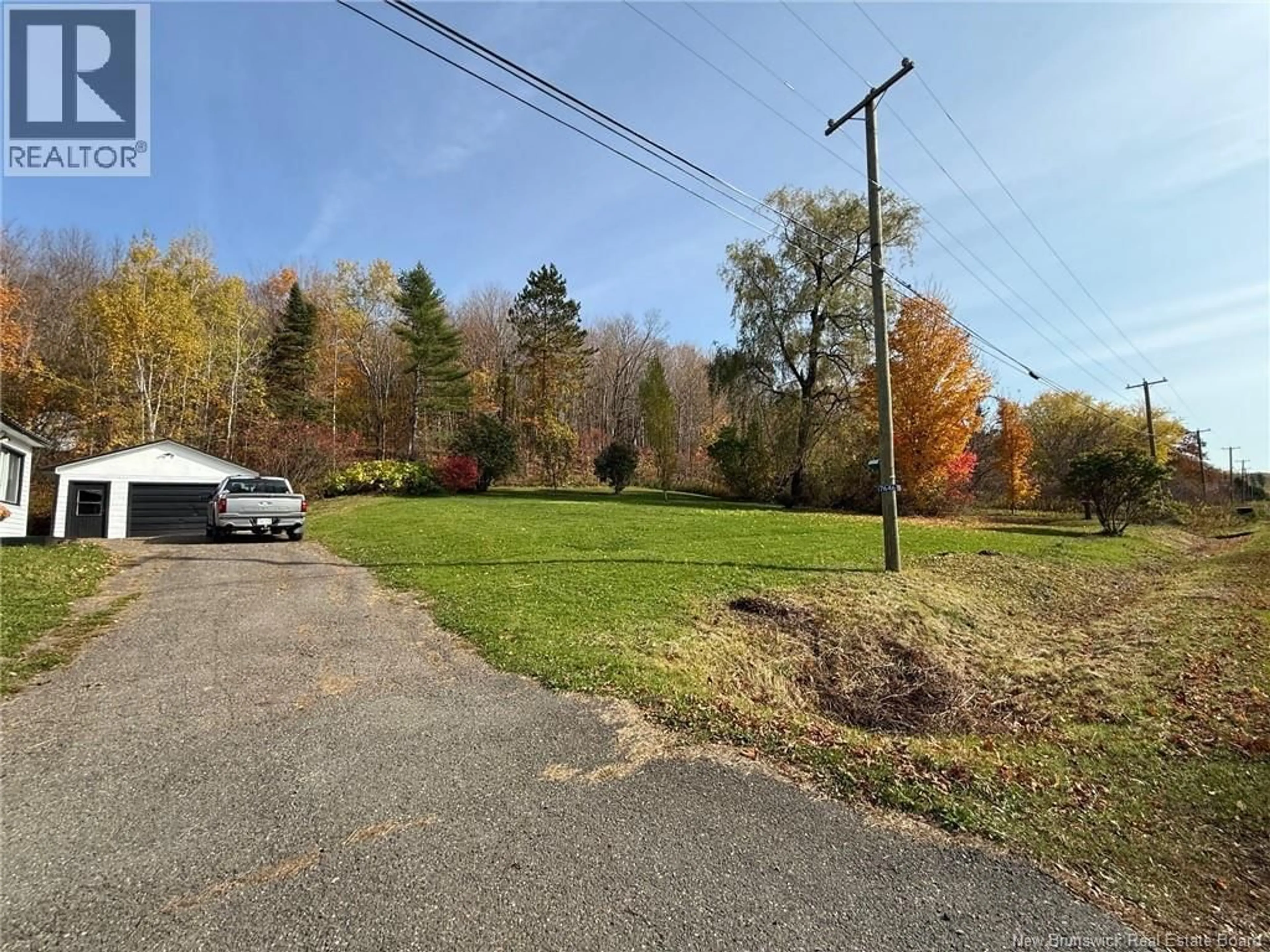 A pic from outside/outdoor area/front of a property/back of a property/a pic from drone, forest/trees view for 7646 105 ROUTE, Peel New Brunswick E7L3Y6