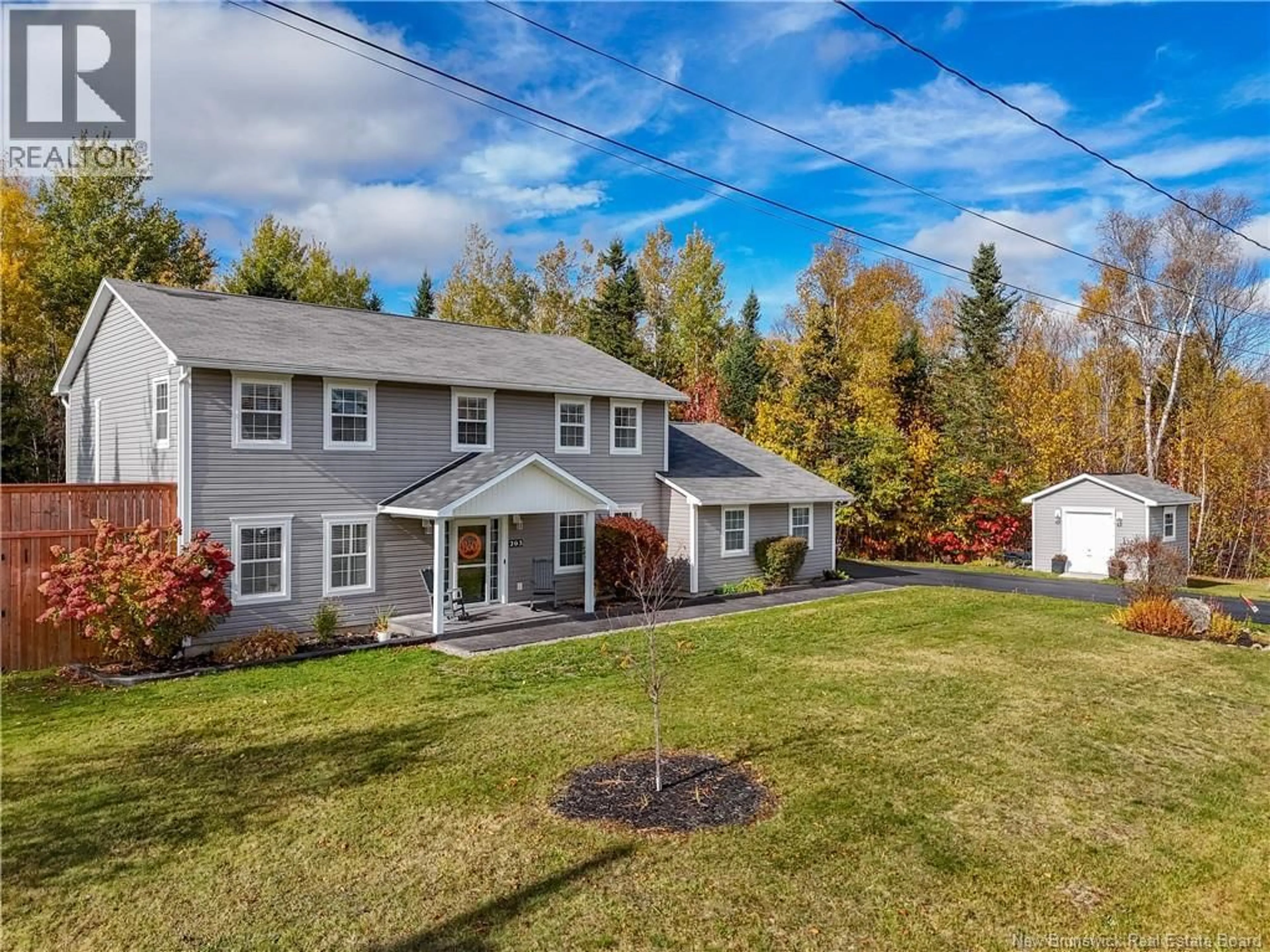 A pic from outside/outdoor area/front of a property/back of a property/a pic from drone, street for 203 GREEN AVENUE, Hanwell New Brunswick E3C0A7