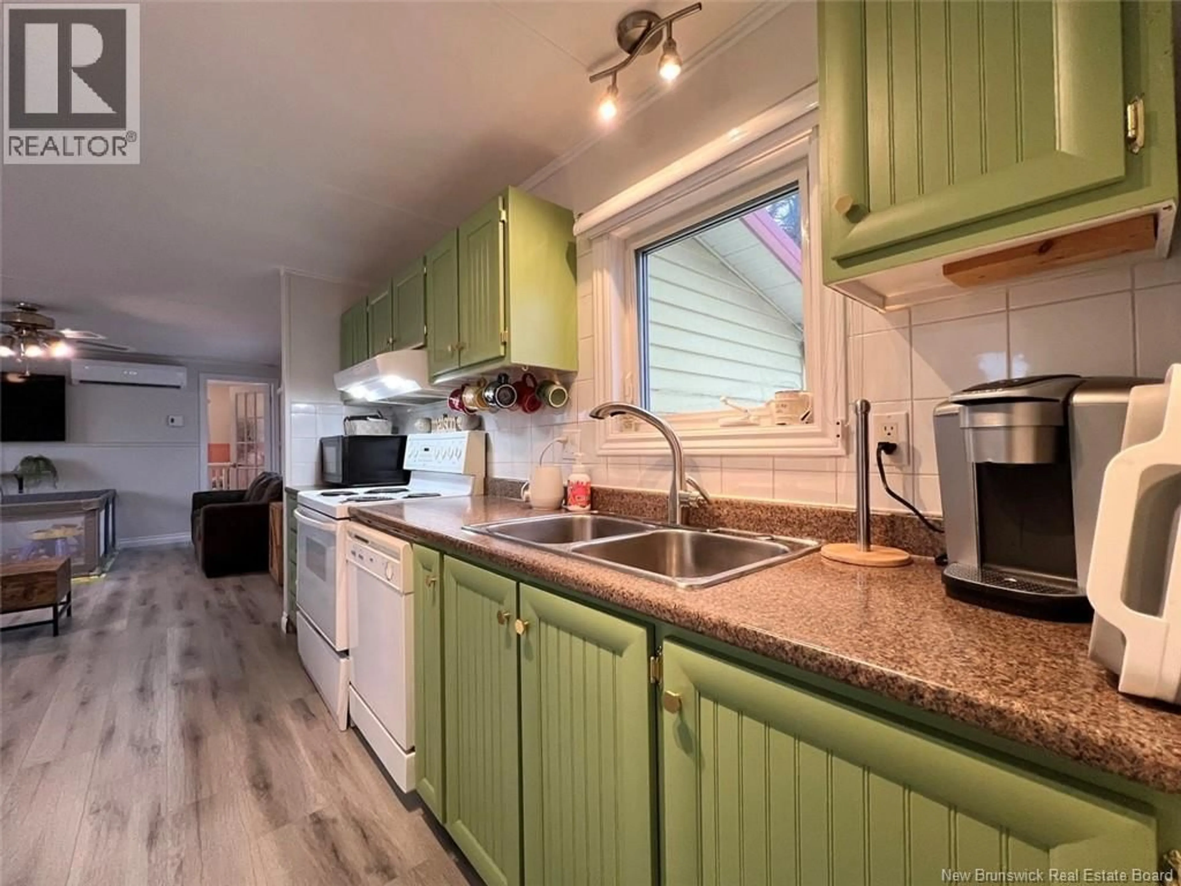 Standard kitchen, wood/laminate floor for 1 PARC P'TISO STREET, Edmundston New Brunswick E3V3X7