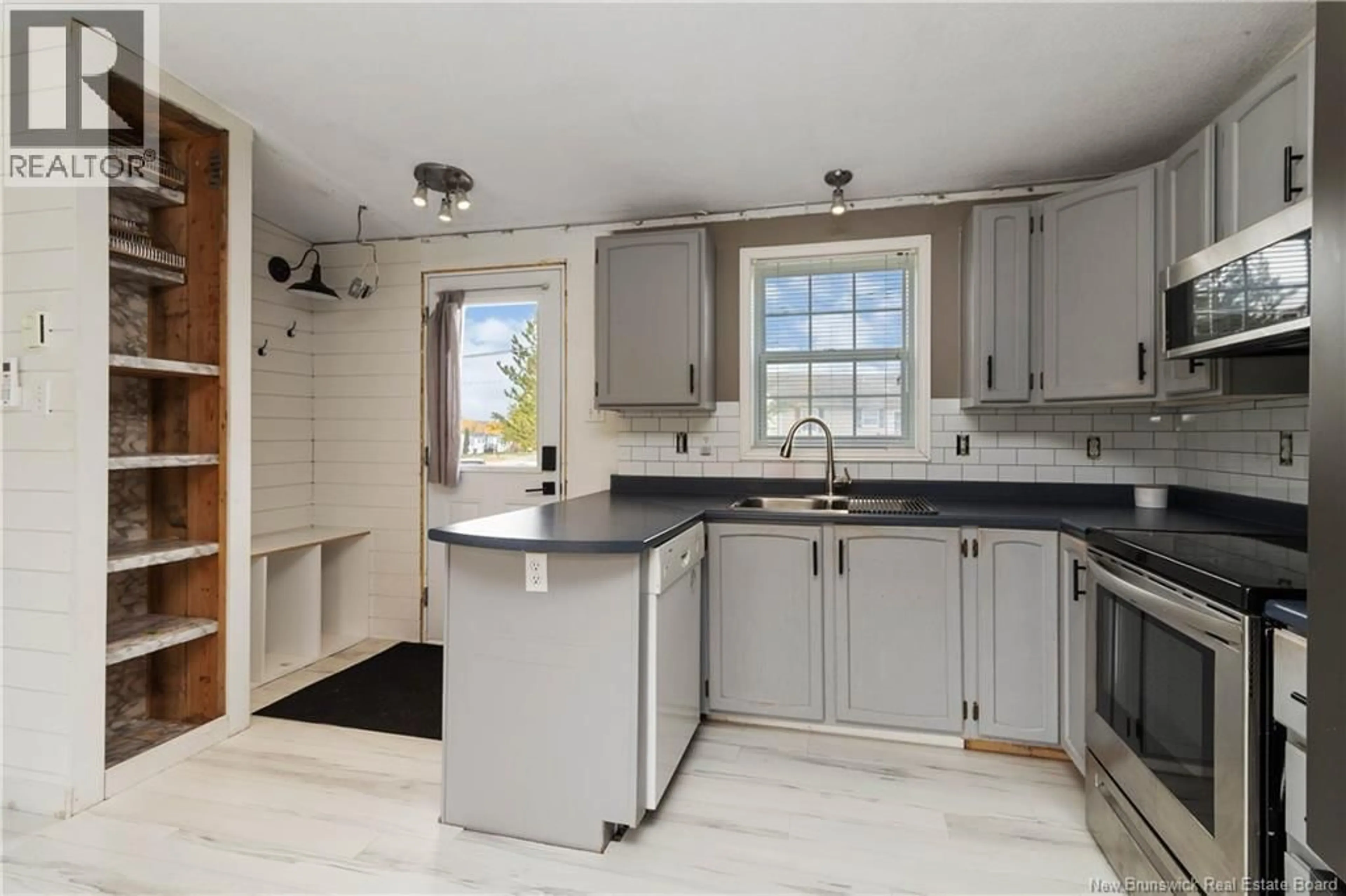 Open concept kitchen, ceramic/tile floor for 50 SOPHIE, Dieppe New Brunswick E1A7C7