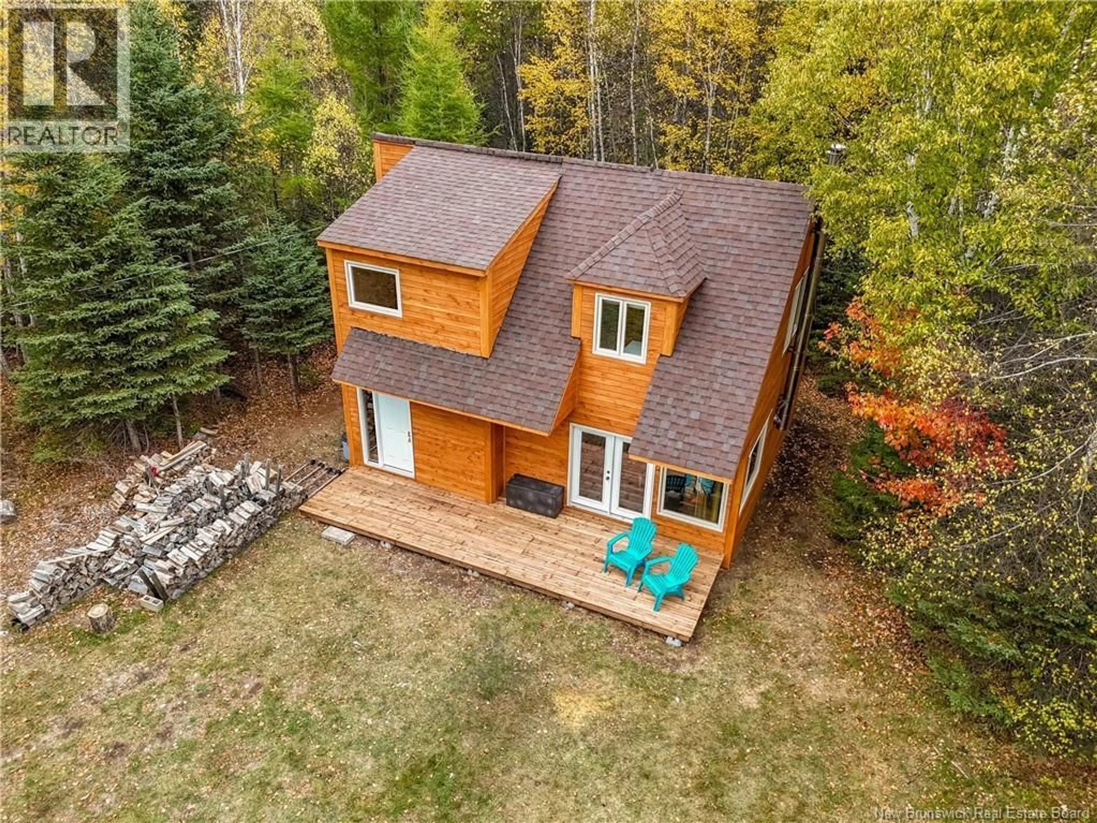 A pic from outside/outdoor area/front of a property/back of a property/a pic from drone, forest/trees view for 13 MEADOWS LANE, Central Hainesville New Brunswick E6E1K4