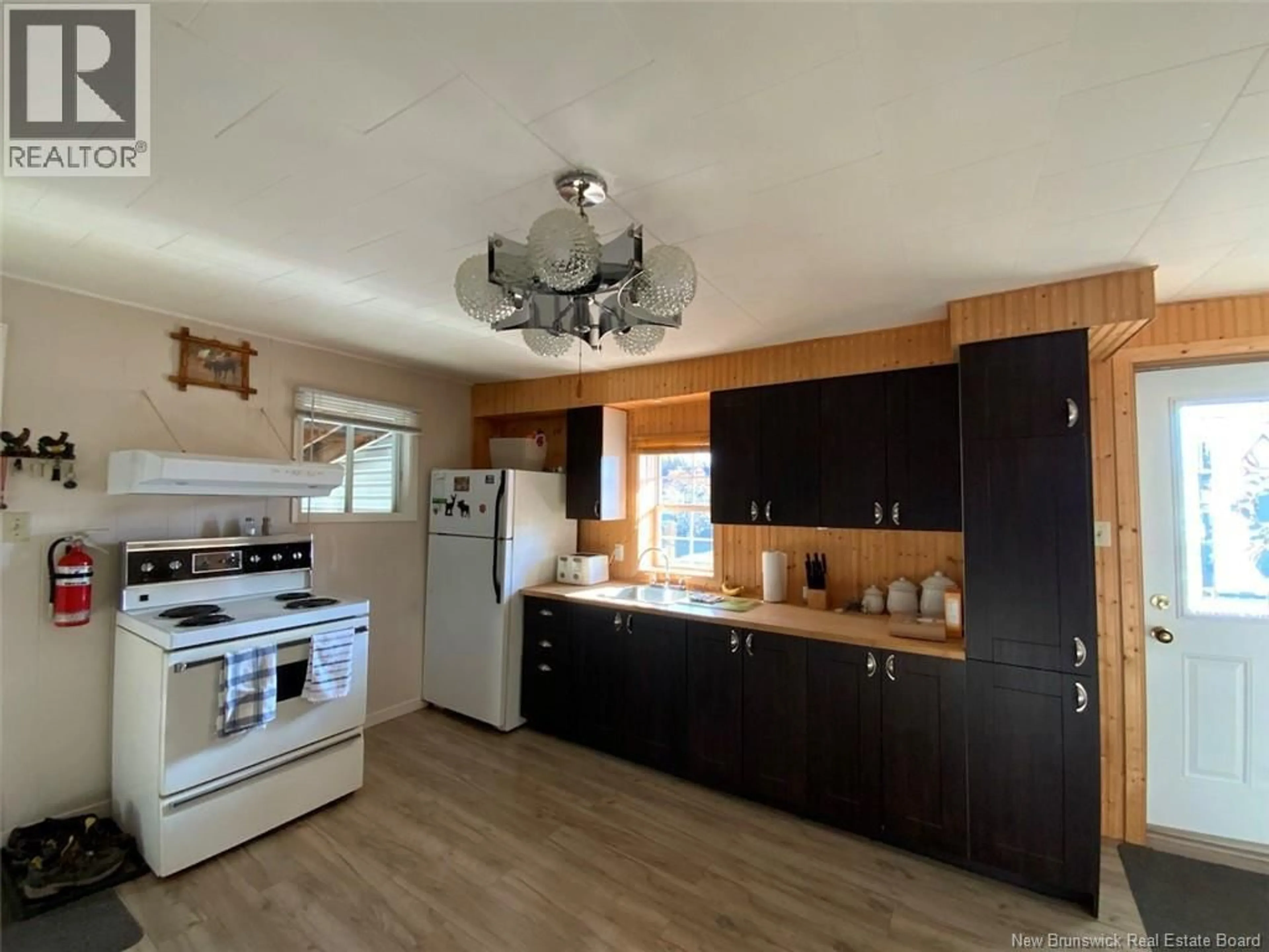 Open concept kitchen, wood/laminate floor for 12 THÉRIAULT STREET, Saint-Basile New Brunswick E7C1N3