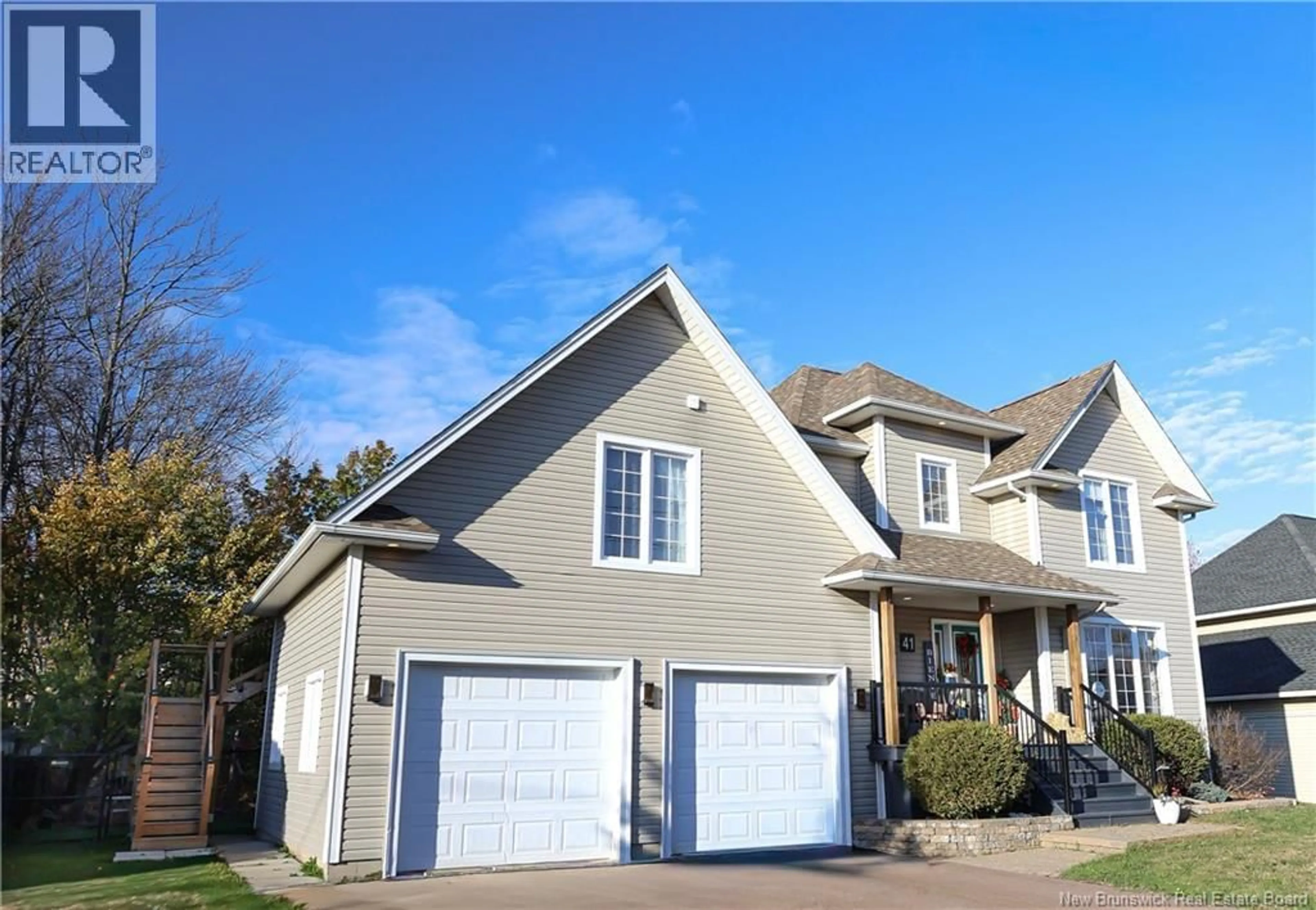 Home with vinyl exterior material, street for 41 CYR STREET, Dieppe New Brunswick E1A8A1