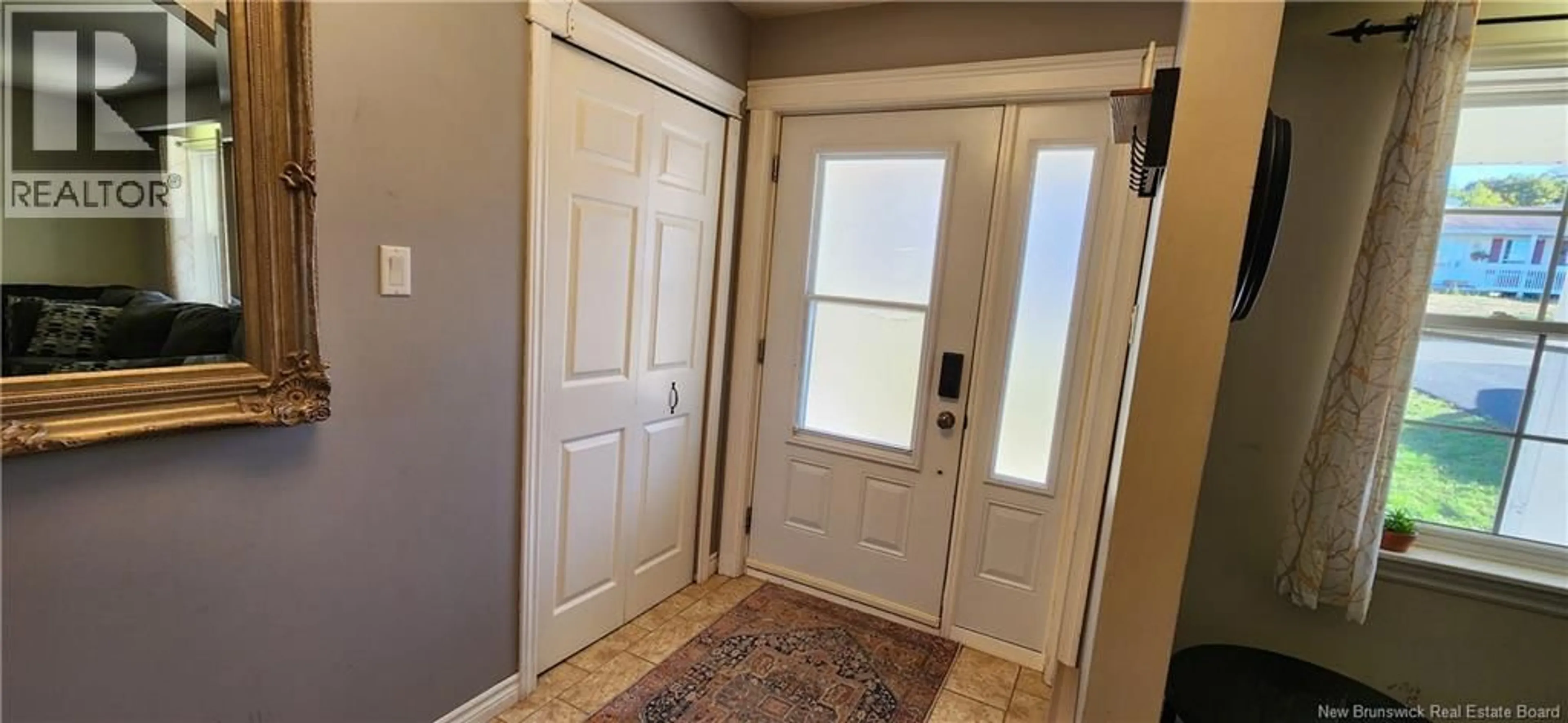Indoor entryway for 24 SANDALWOOD CRESCENT, Saint John New Brunswick E2M5L3