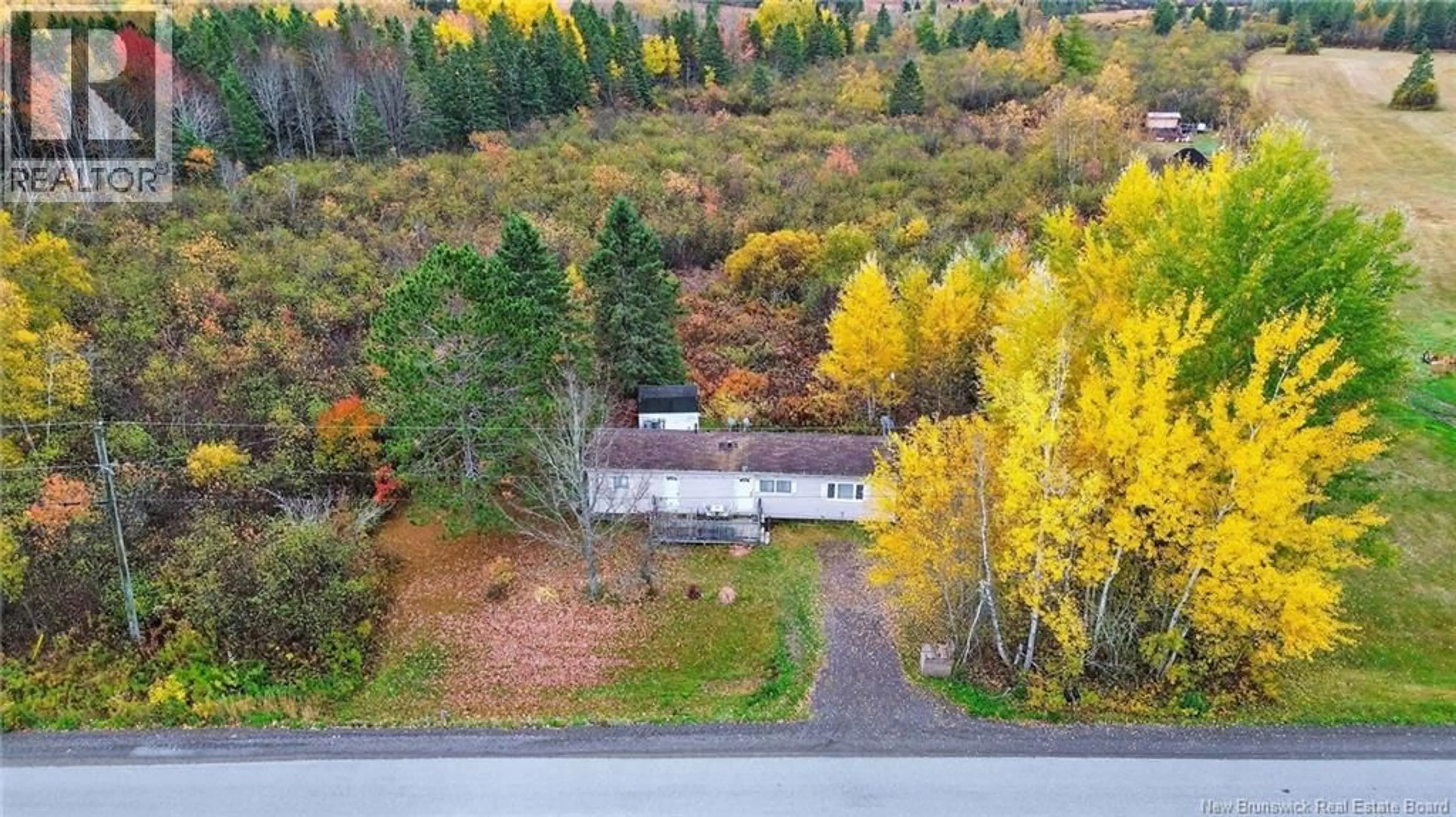 A pic from outside/outdoor area/front of a property/back of a property/a pic from drone, forest/trees view for 410 SCOTT ROAD, River Glade New Brunswick E4Z3P9