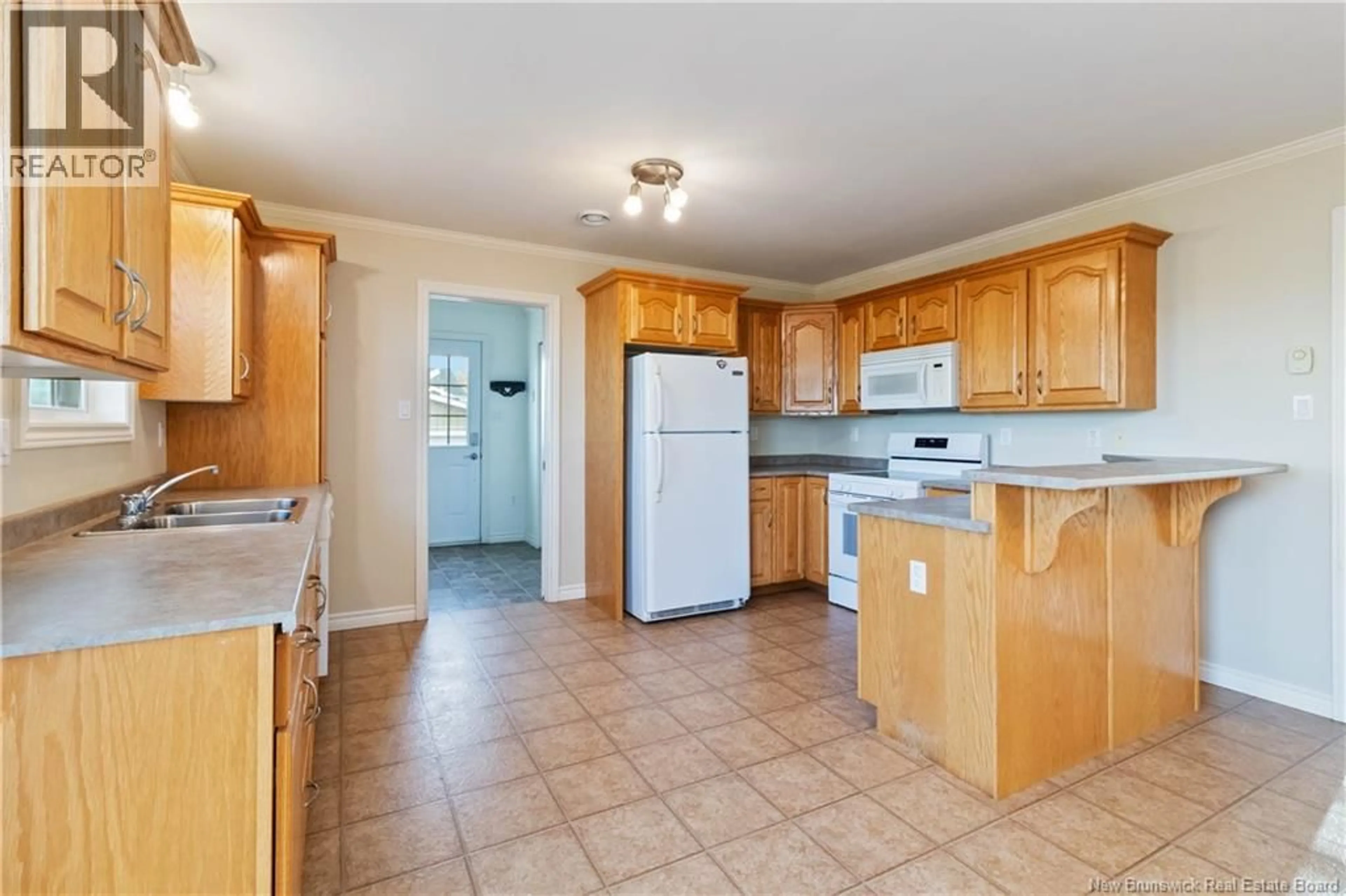 Standard kitchen, ceramic/tile floor for 114 LEANDRE STREET, Memramcook New Brunswick E4K2G1