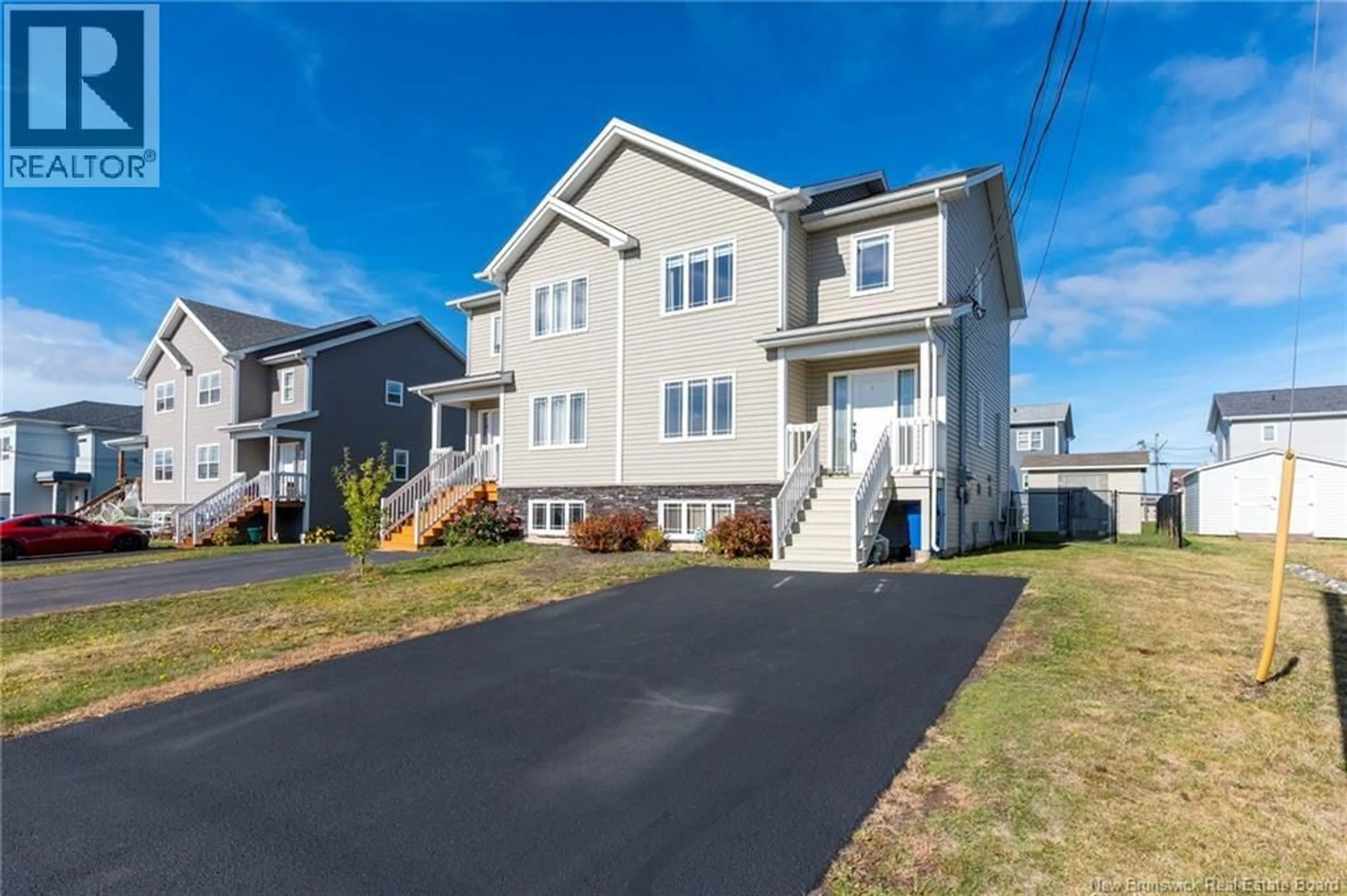 Home with vinyl exterior material, street for 99 MATHIAS, Dieppe New Brunswick E1A8N5