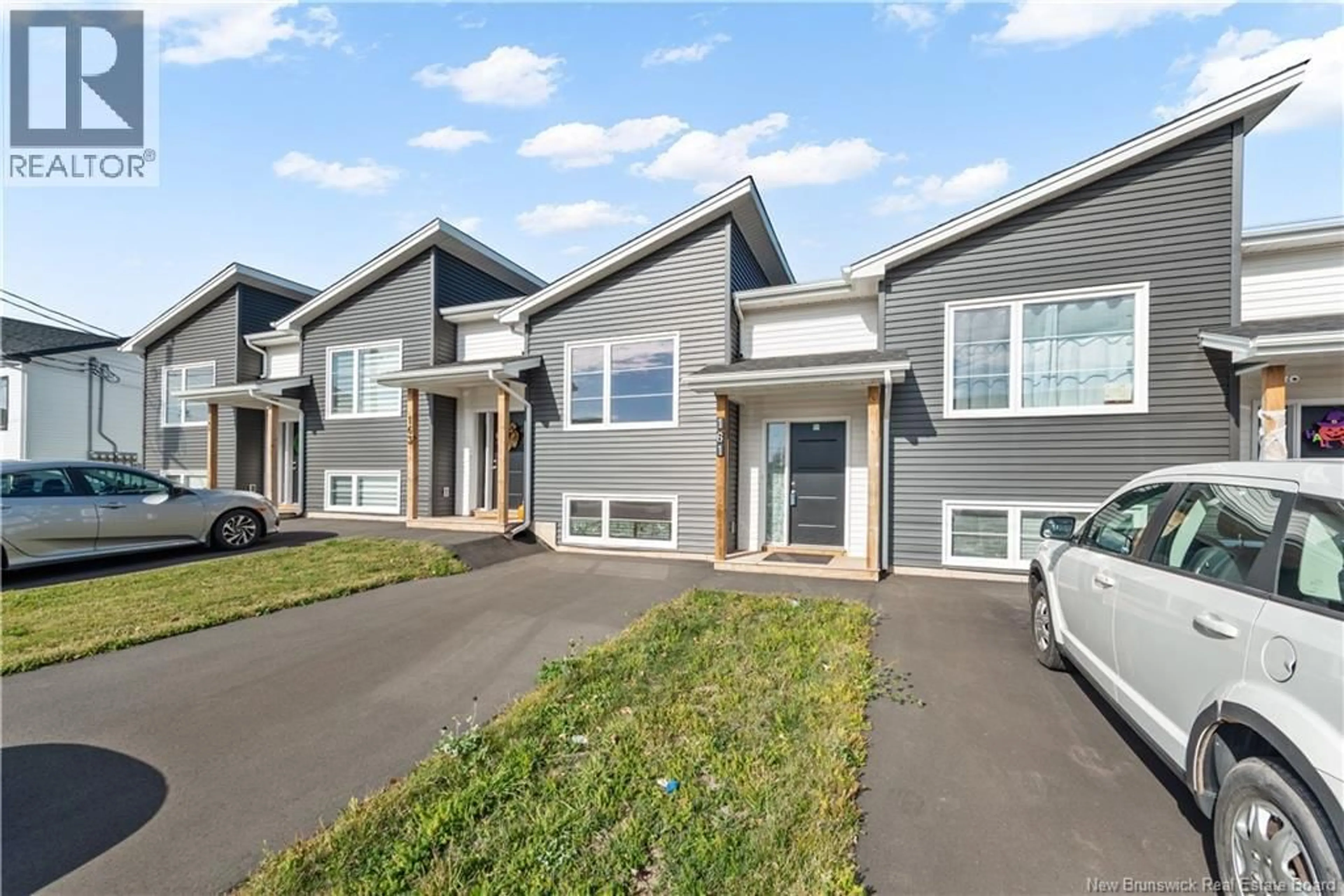 Home with vinyl exterior material, street for 161 ERNEST, Dieppe New Brunswick E1A4T3