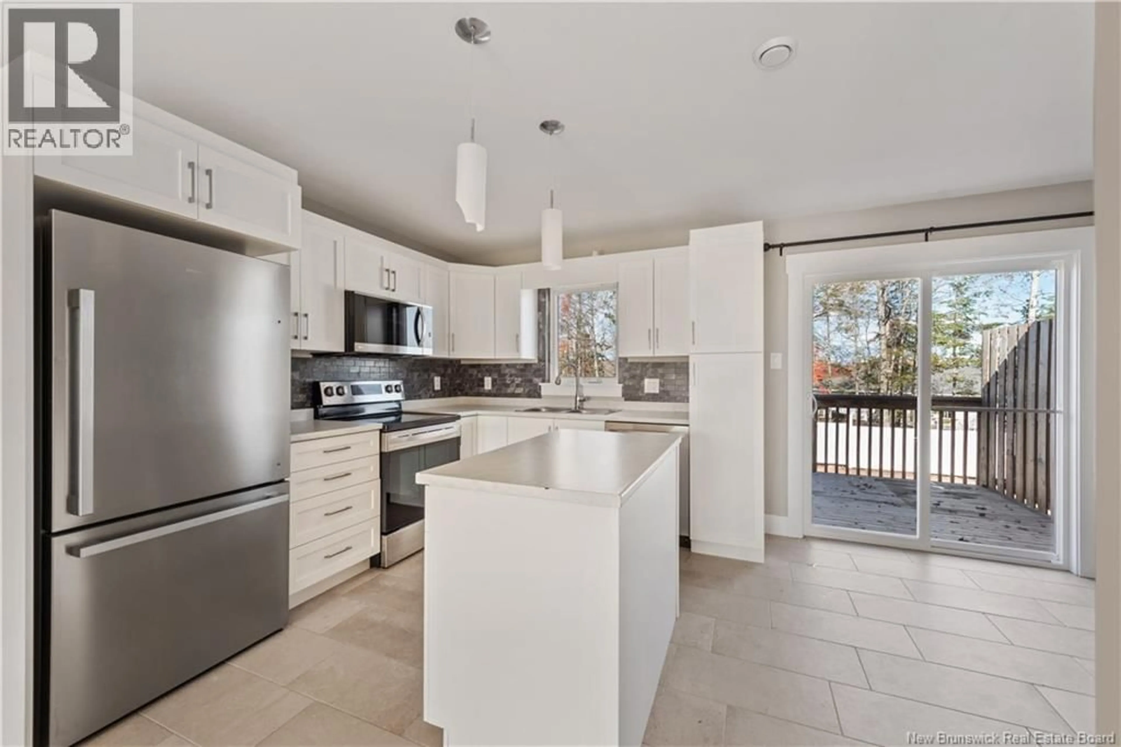 Open concept kitchen, ceramic/tile floor for 161 ERNEST, Dieppe New Brunswick E1A4T3