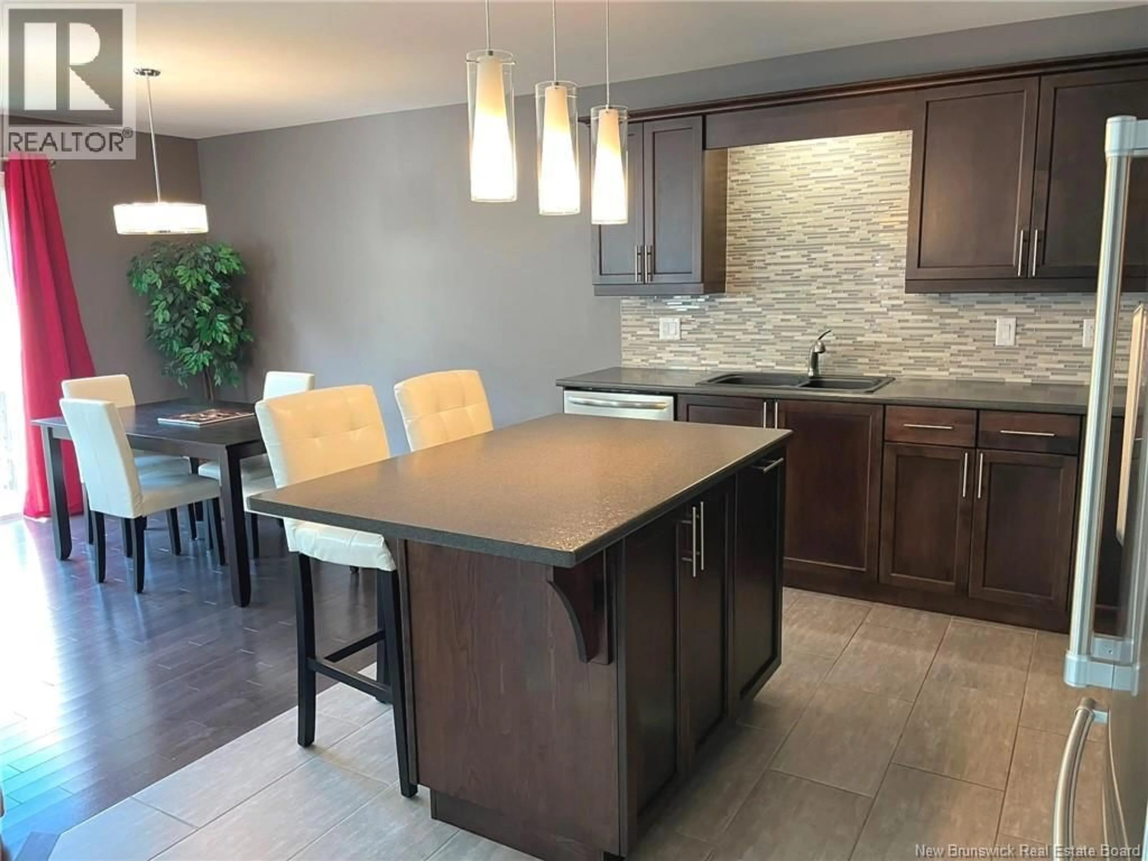 Open concept kitchen, ceramic/tile floor for 371 DOLBEAU STREET, Dieppe New Brunswick E1A9P9