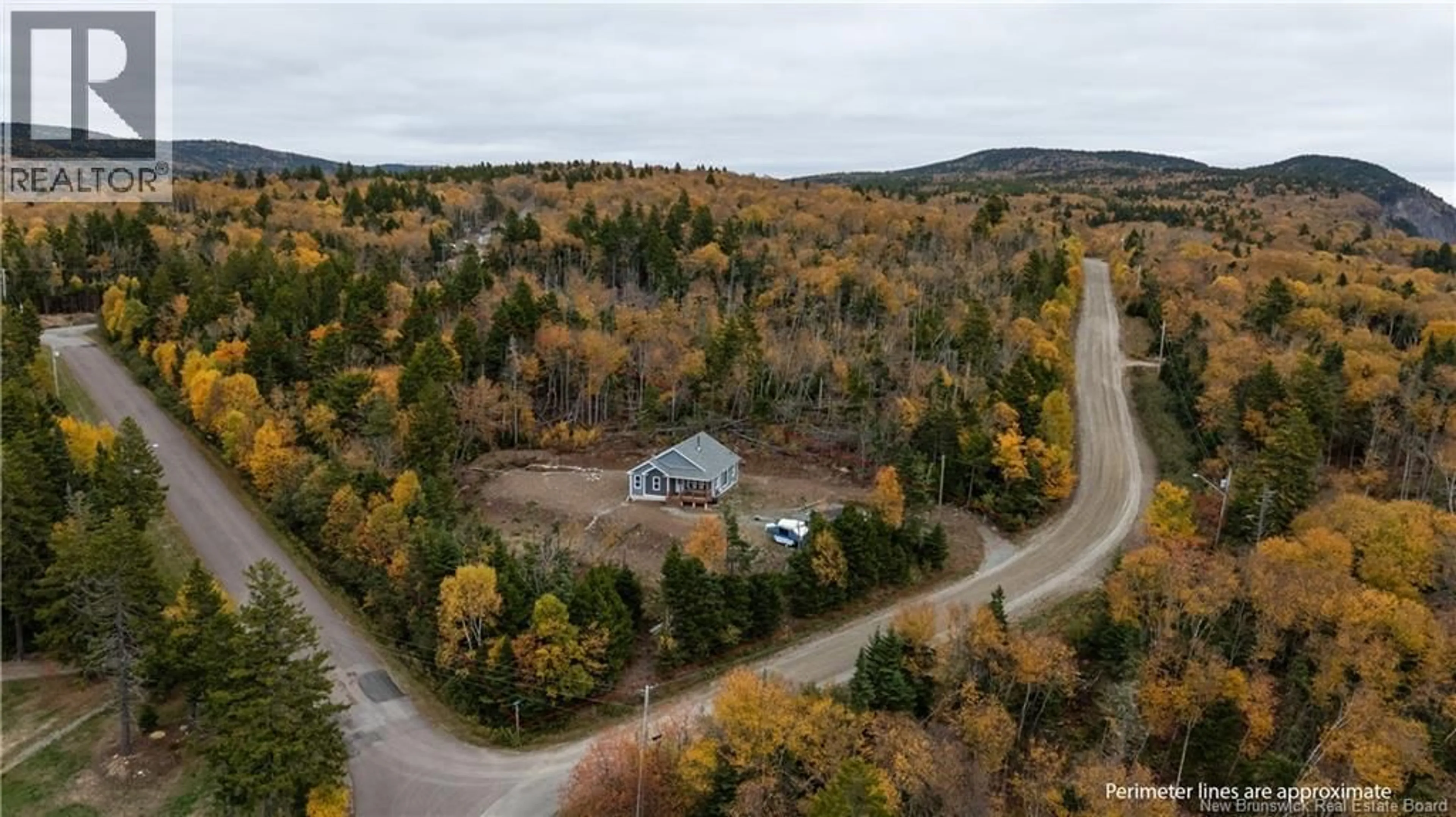 A pic from outside/outdoor area/front of a property/back of a property/a pic from drone, forest/trees view for 39 CHIGNECTO DRIVE, Alma New Brunswick E4H1V9