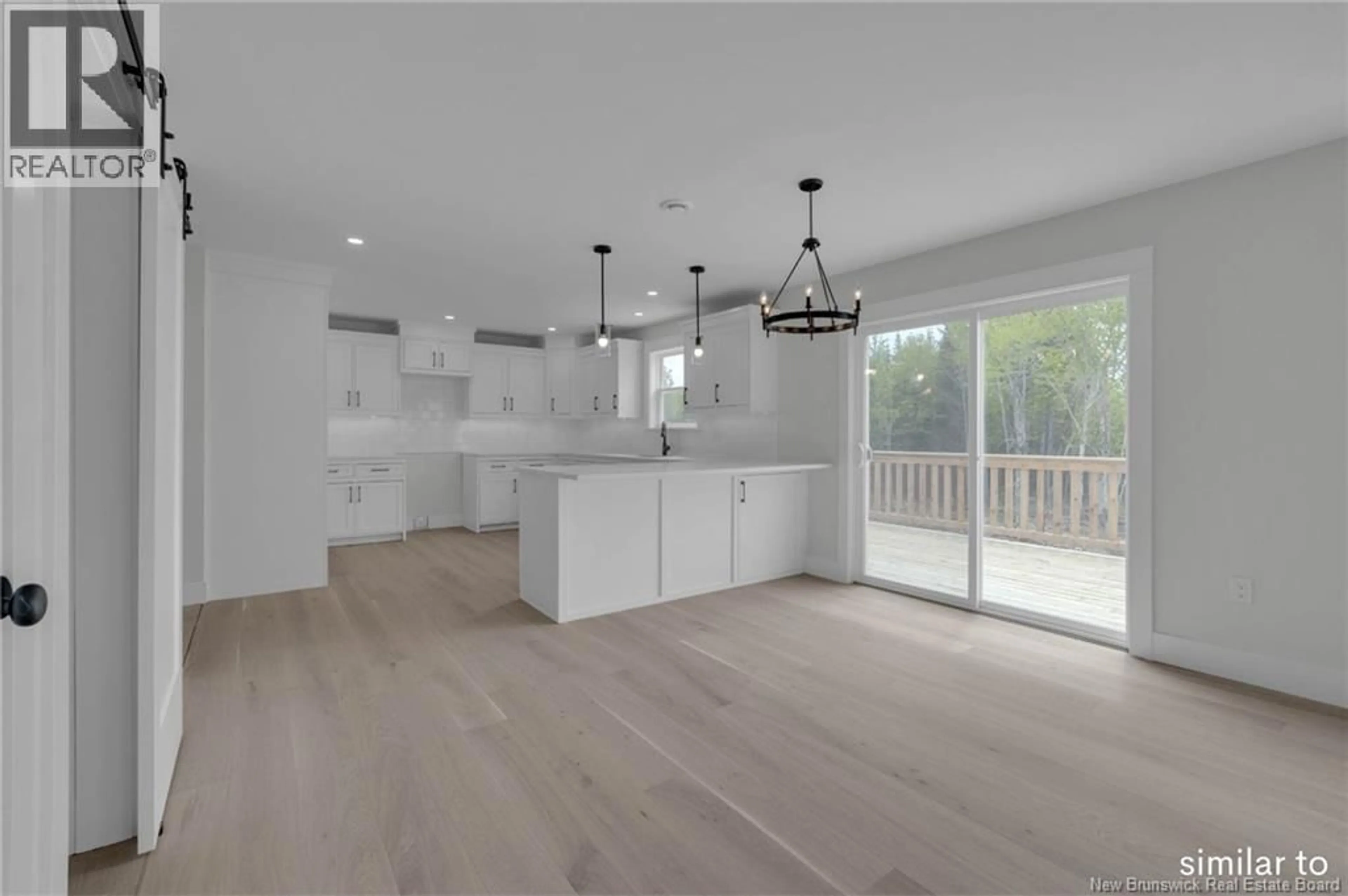 Open concept kitchen, wood/laminate floor for 36 MONTANA DRIVE, Quispamsis New Brunswick E2E5X2