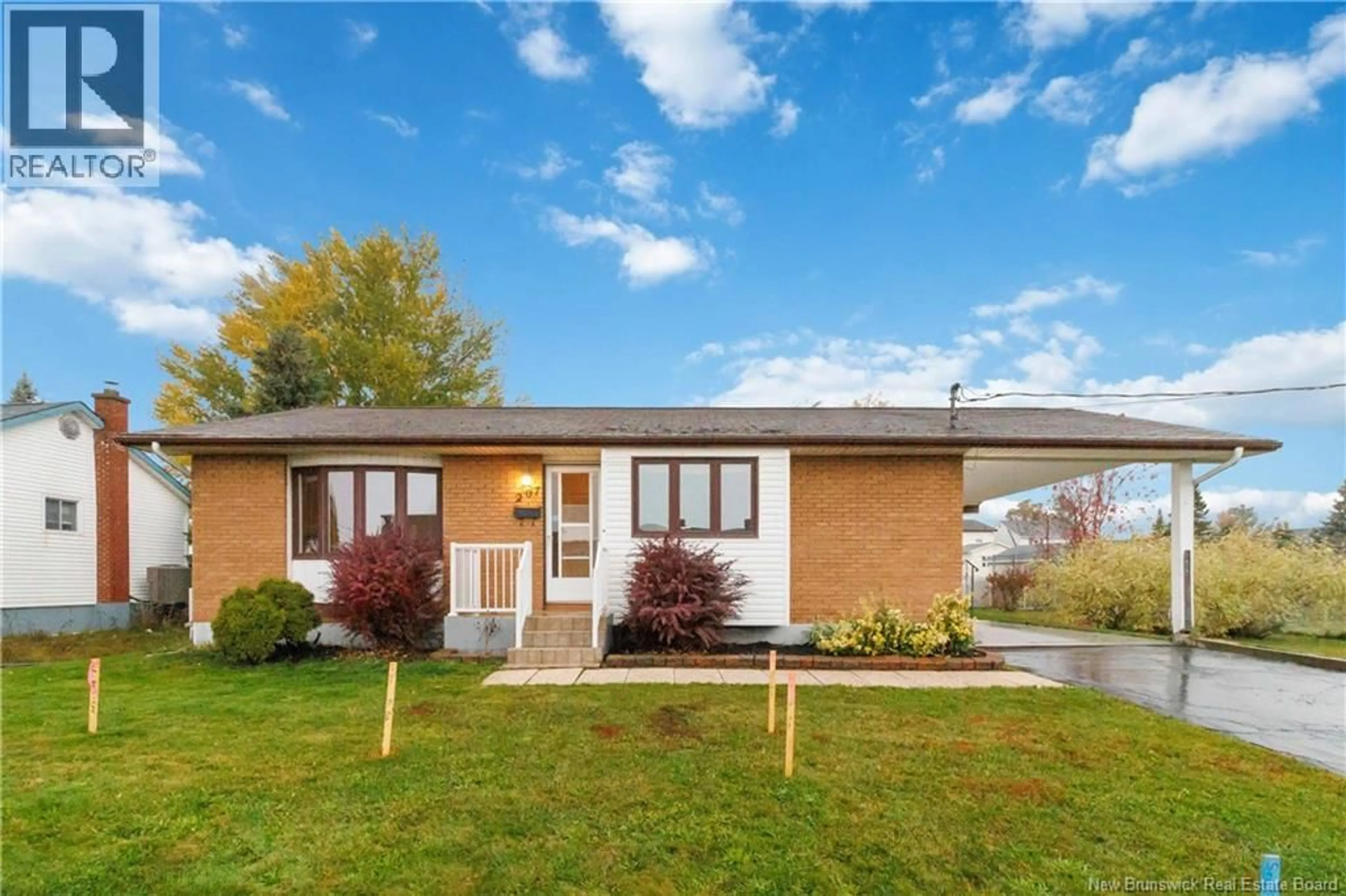 Home with vinyl exterior material, street for 207 ST LAURENT STREET, Dieppe New Brunswick E1A1S2