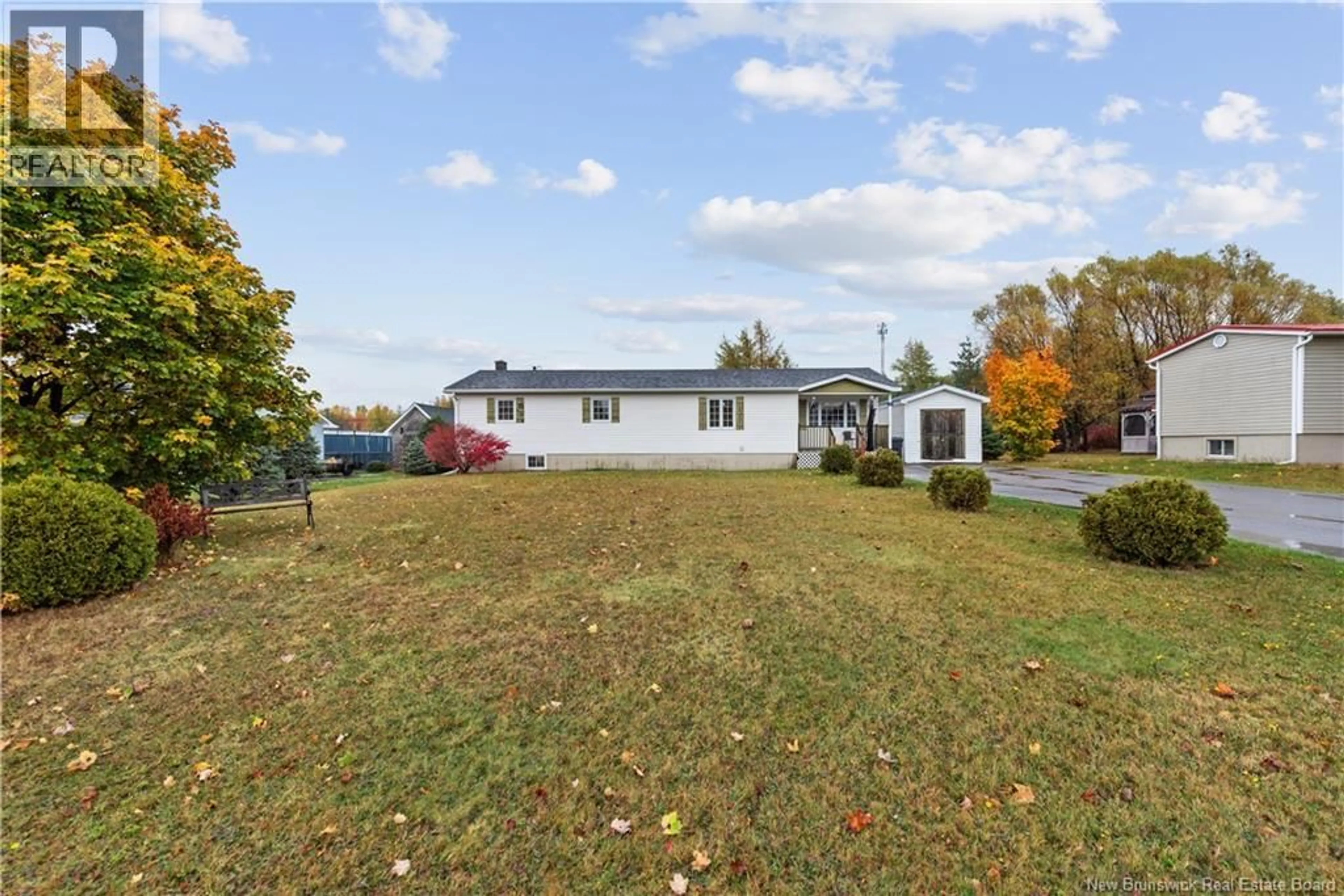 A pic from outside/outdoor area/front of a property/back of a property/a pic from drone, water/lake/river/ocean view for 15 RUE THIBODEAU, Rogersville New Brunswick E4Y1S9