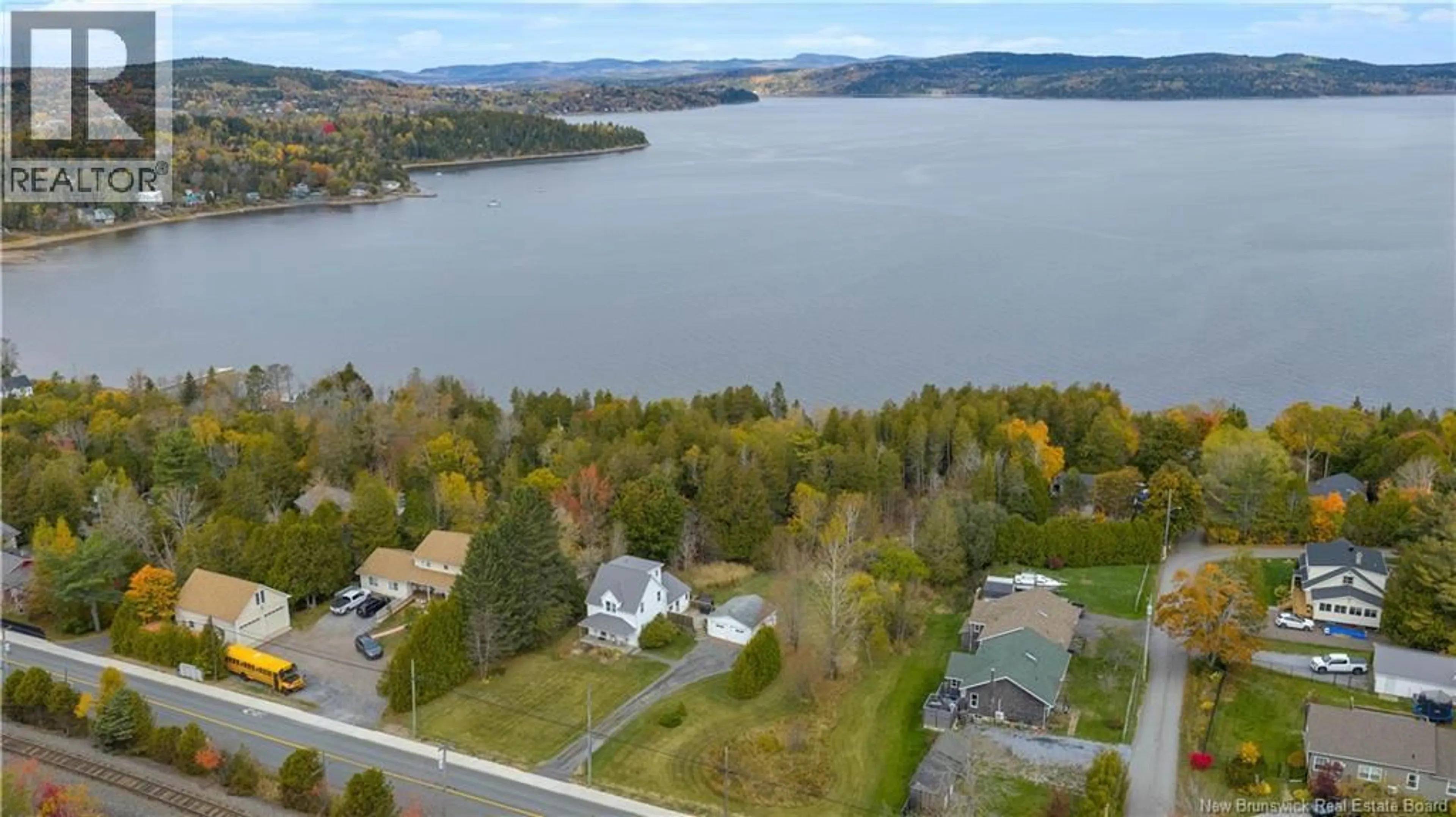 A pic from outside/outdoor area/front of a property/back of a property/a pic from drone, water/lake/river/ocean view for 2754 WESTFIELD ROAD, Saint John New Brunswick E2M6P8