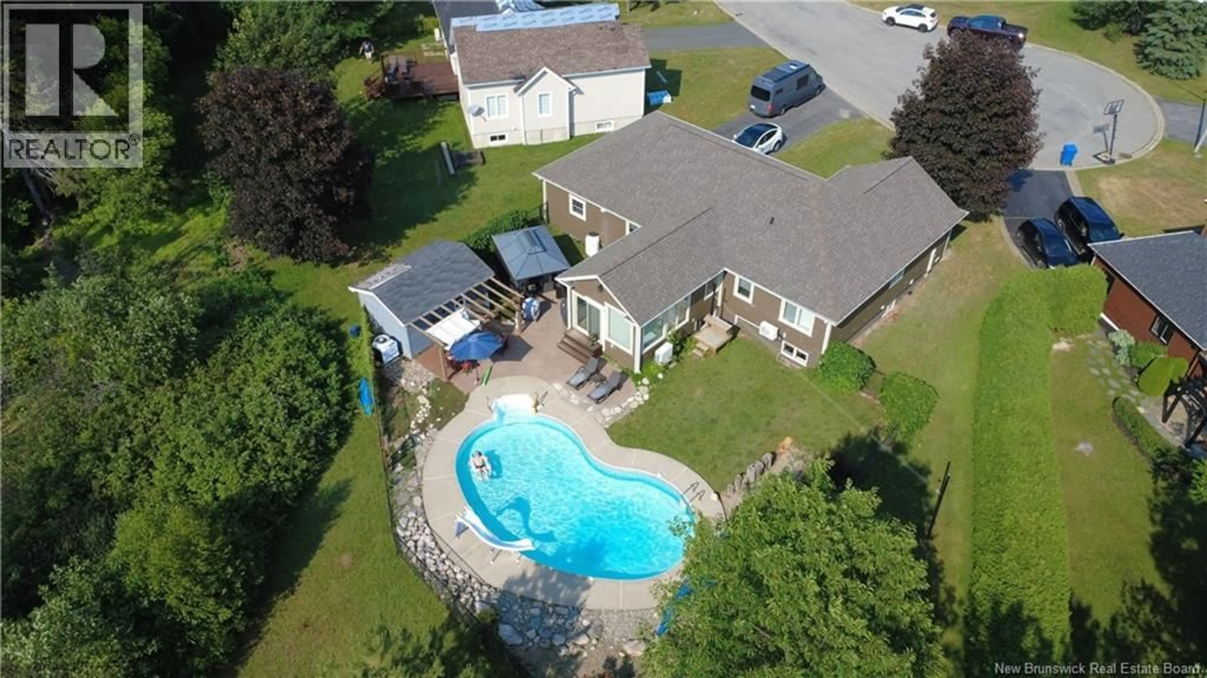A pic from outside/outdoor area/front of a property/back of a property/a pic from drone, water/lake/river/ocean view for 125 FAIRVIEW COURT, Bathurst New Brunswick E2A4X5