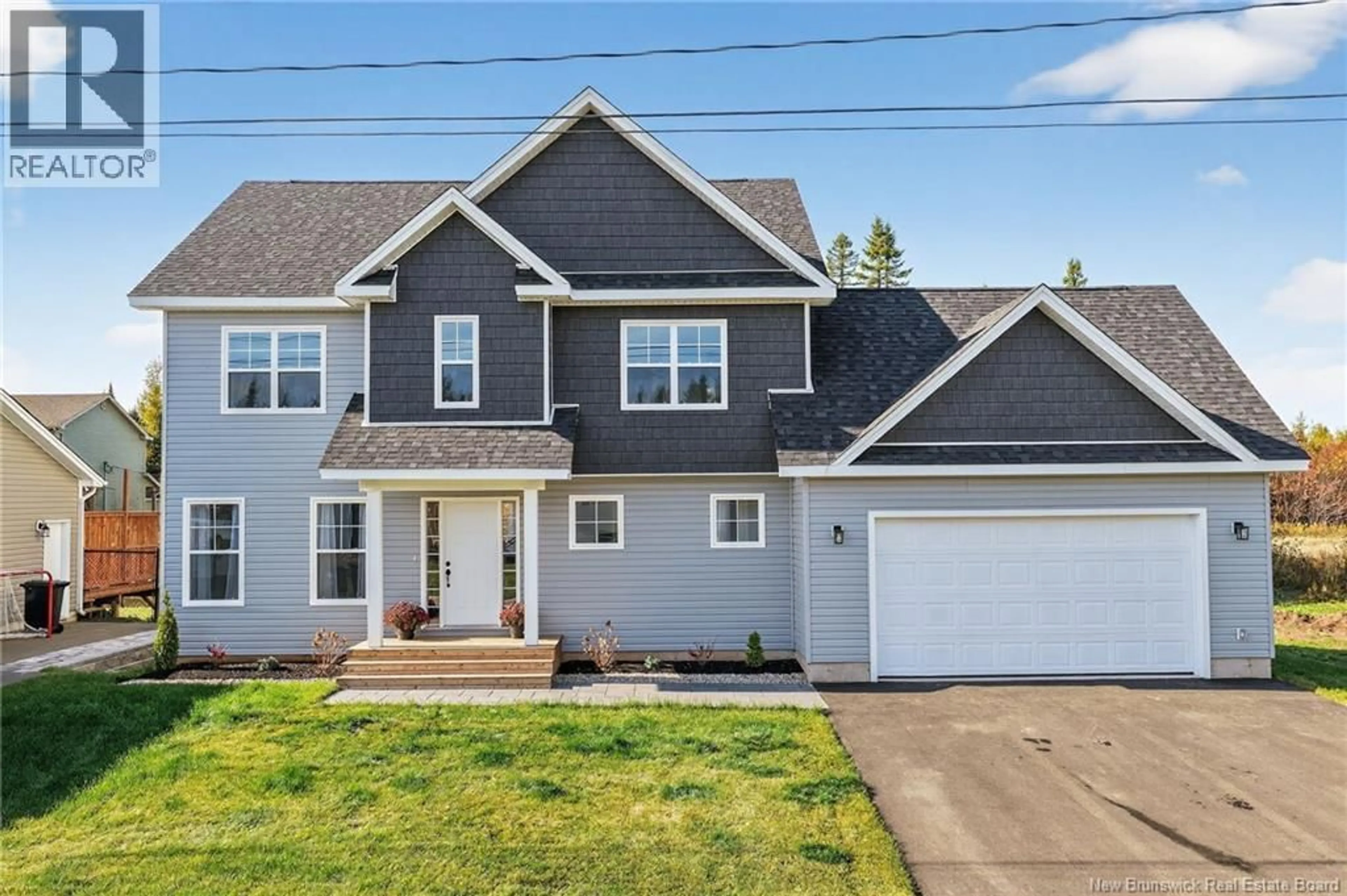 Home with vinyl exterior material, street for 26 SYCAMORE DRIVE, Moncton New Brunswick E1E0K1