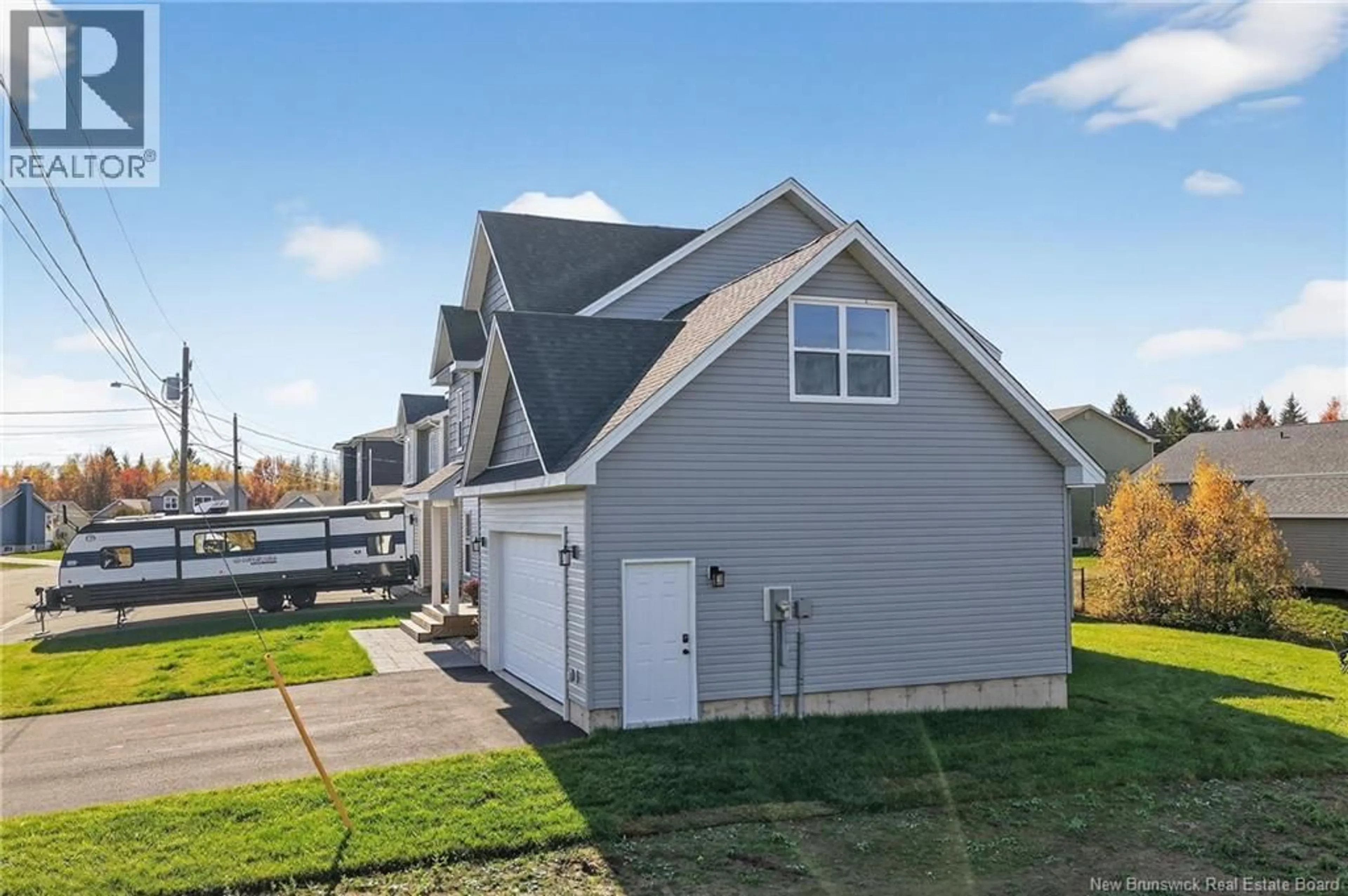 Home with vinyl exterior material, street for 26 SYCAMORE DRIVE, Moncton New Brunswick E1E0K1