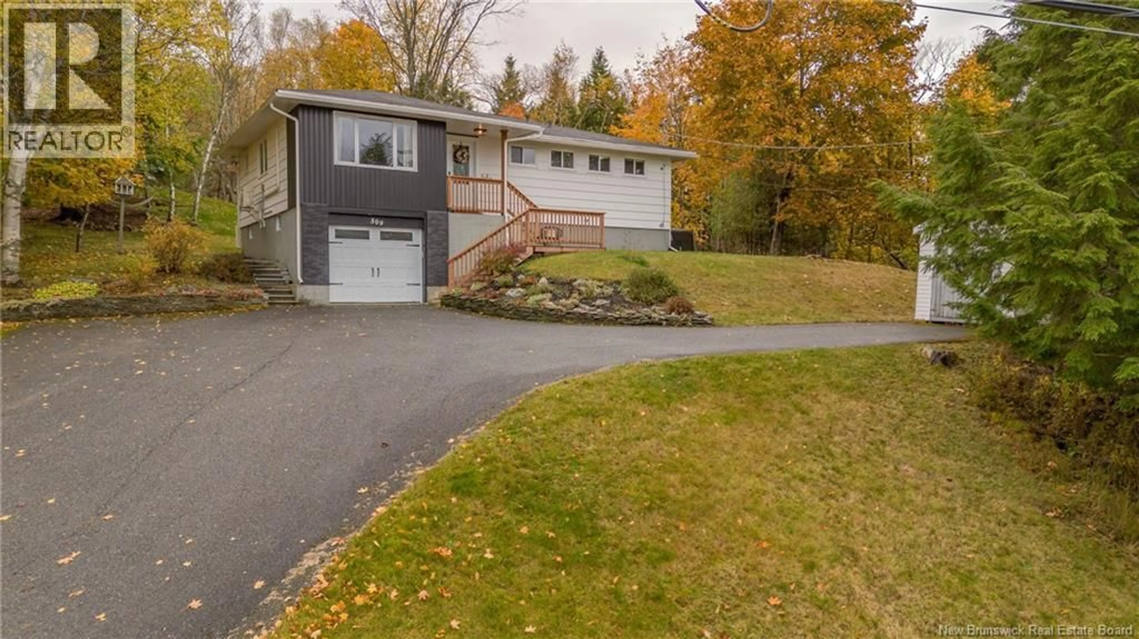 A pic from outside/outdoor area/front of a property/back of a property/a pic from drone, street for 509 BOARS HEAD ROAD, Saint John New Brunswick E2K5C1