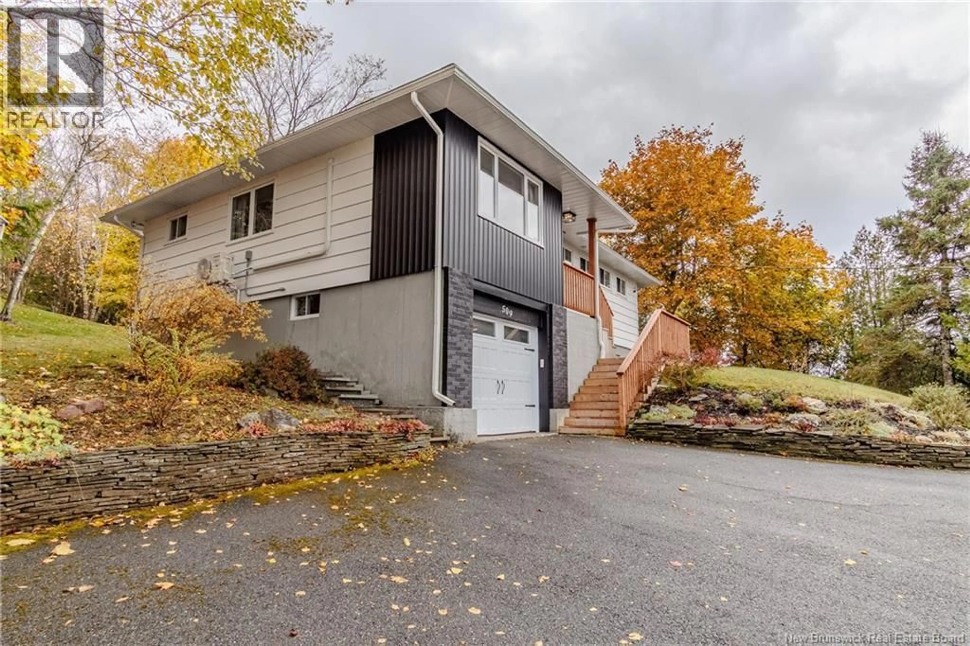Home with vinyl exterior material, street for 509 BOARS HEAD ROAD, Saint John New Brunswick E2K5C1