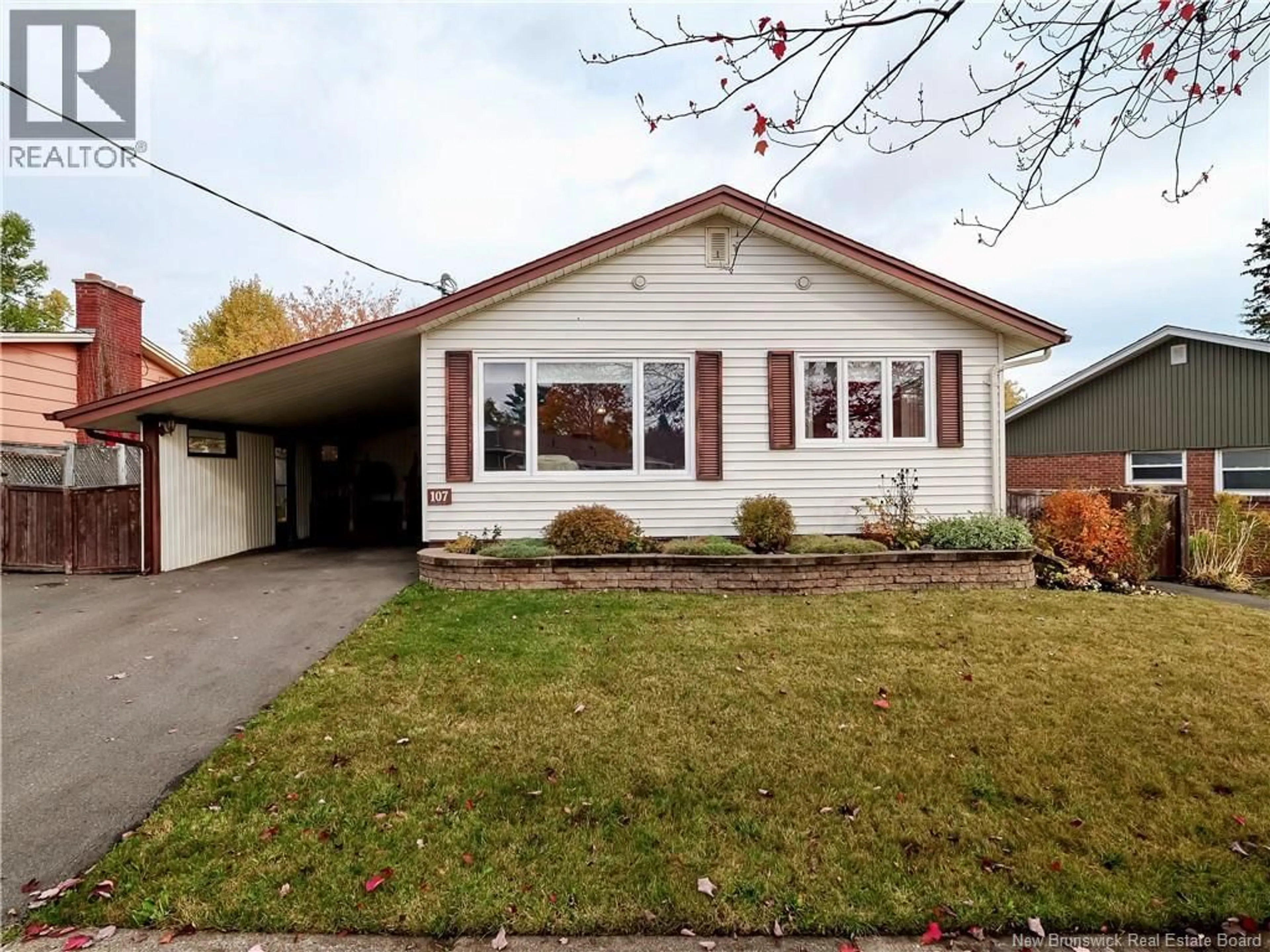 Home with vinyl exterior material, street for 107 CARNEY, Moncton New Brunswick E1C4J1