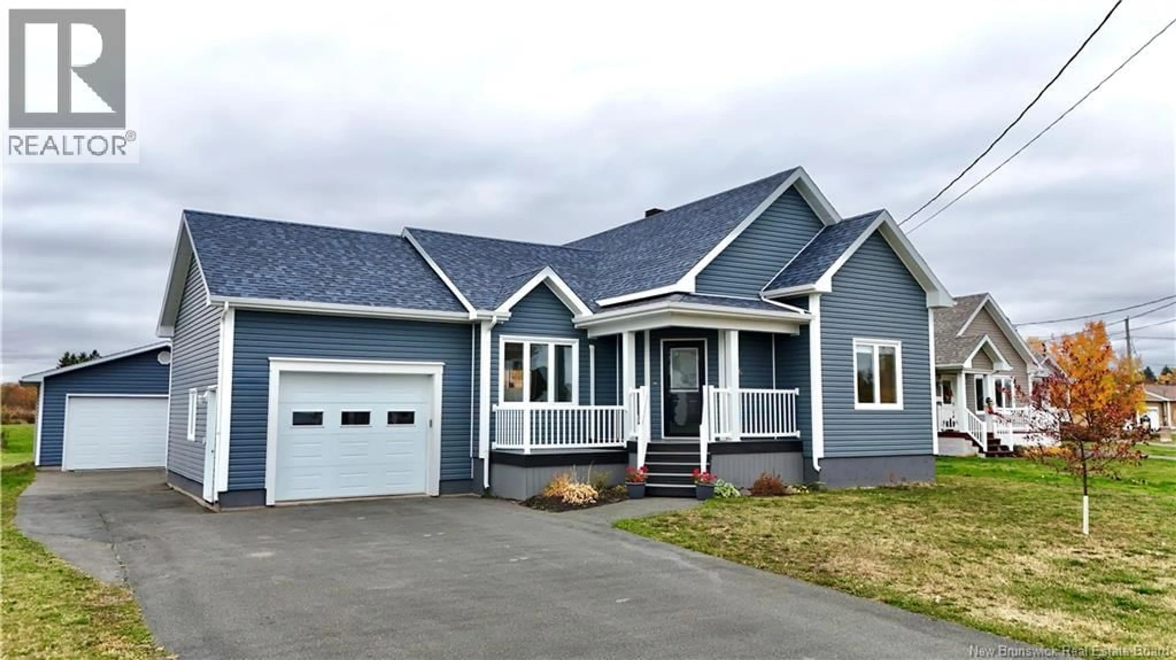 Home with vinyl exterior material, street for 656 BAIE, Beresford New Brunswick E8K1X2
