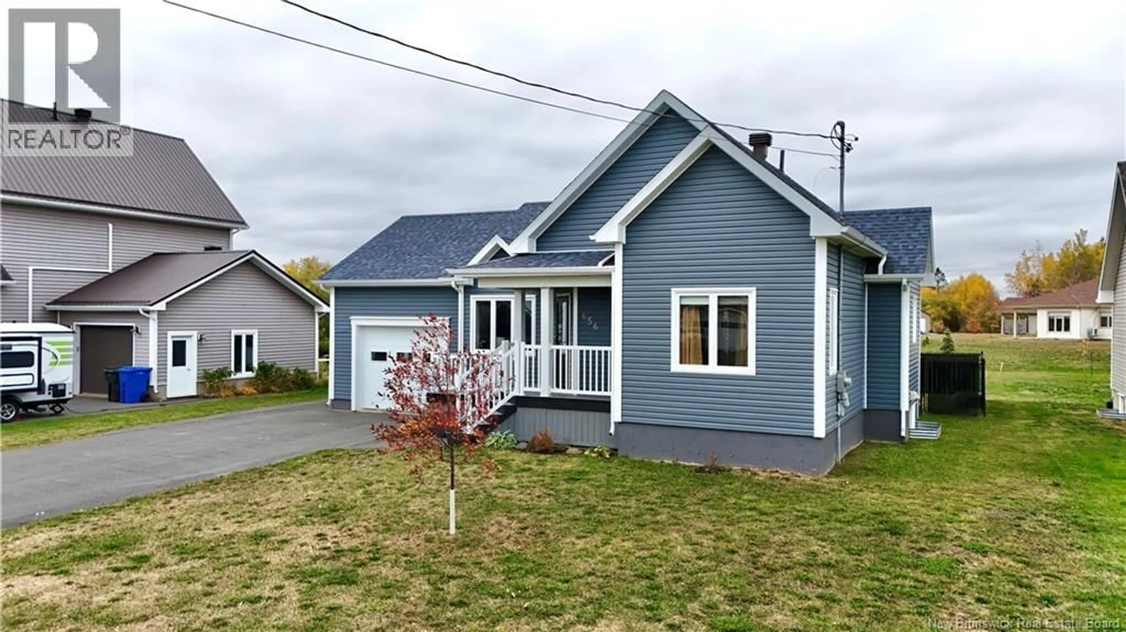Home with vinyl exterior material, street for 656 BAIE, Beresford New Brunswick E8K1X2