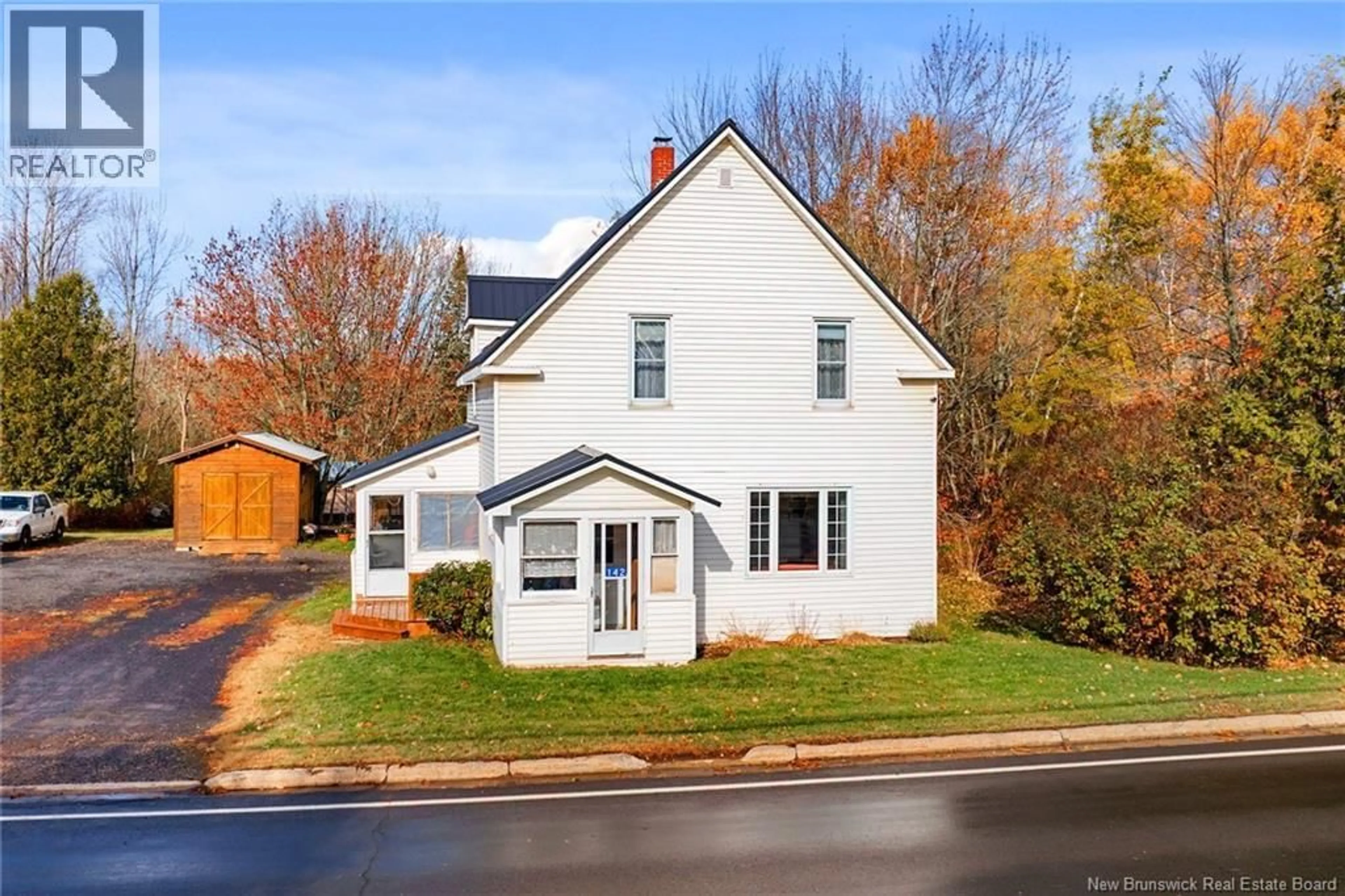 Home with vinyl exterior material, street for 142 MAIN STREET, Chipman New Brunswick E4A1X4