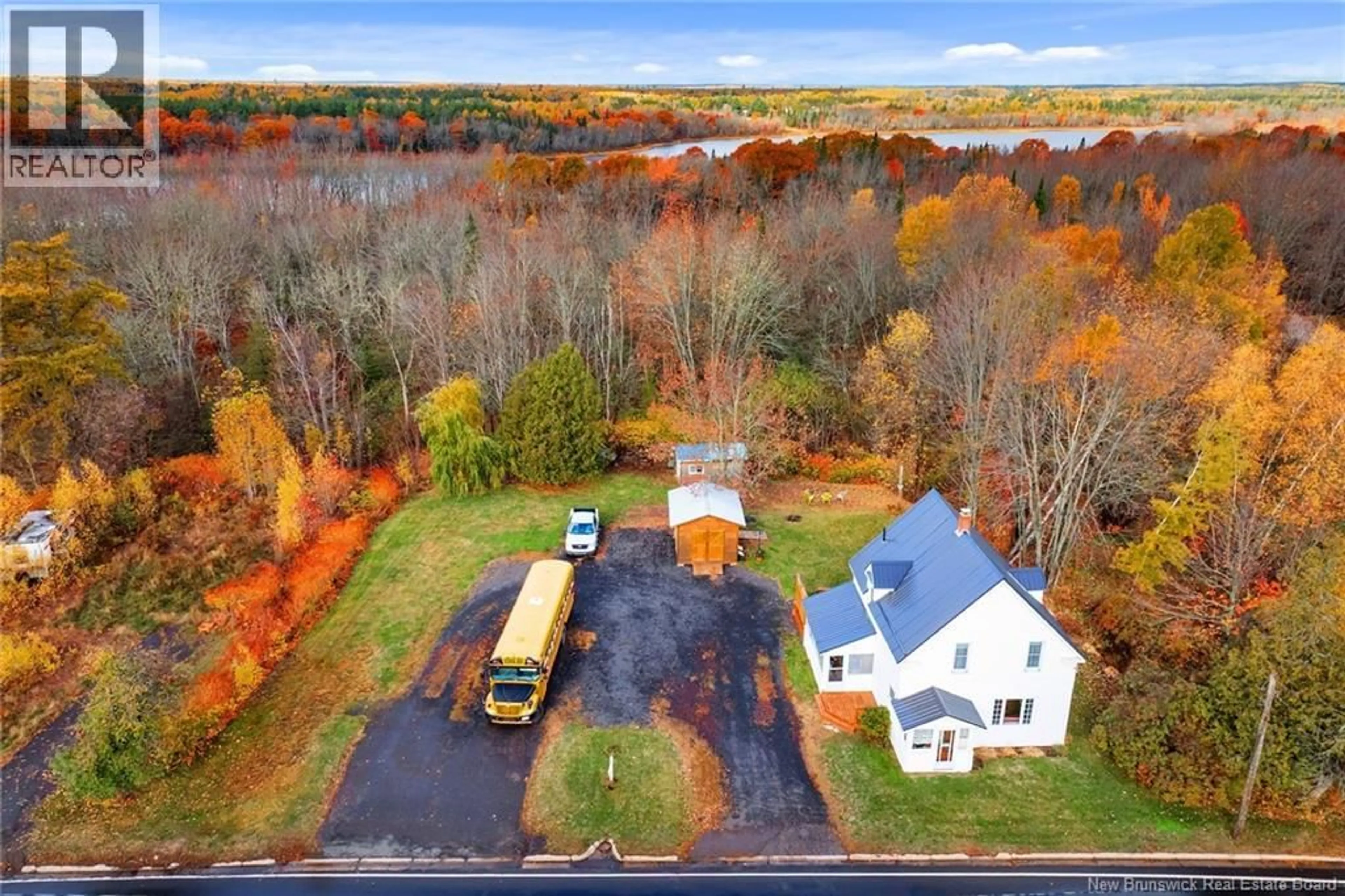 A pic from outside/outdoor area/front of a property/back of a property/a pic from drone, water/lake/river/ocean view for 142 MAIN STREET, Chipman New Brunswick E4A1X4