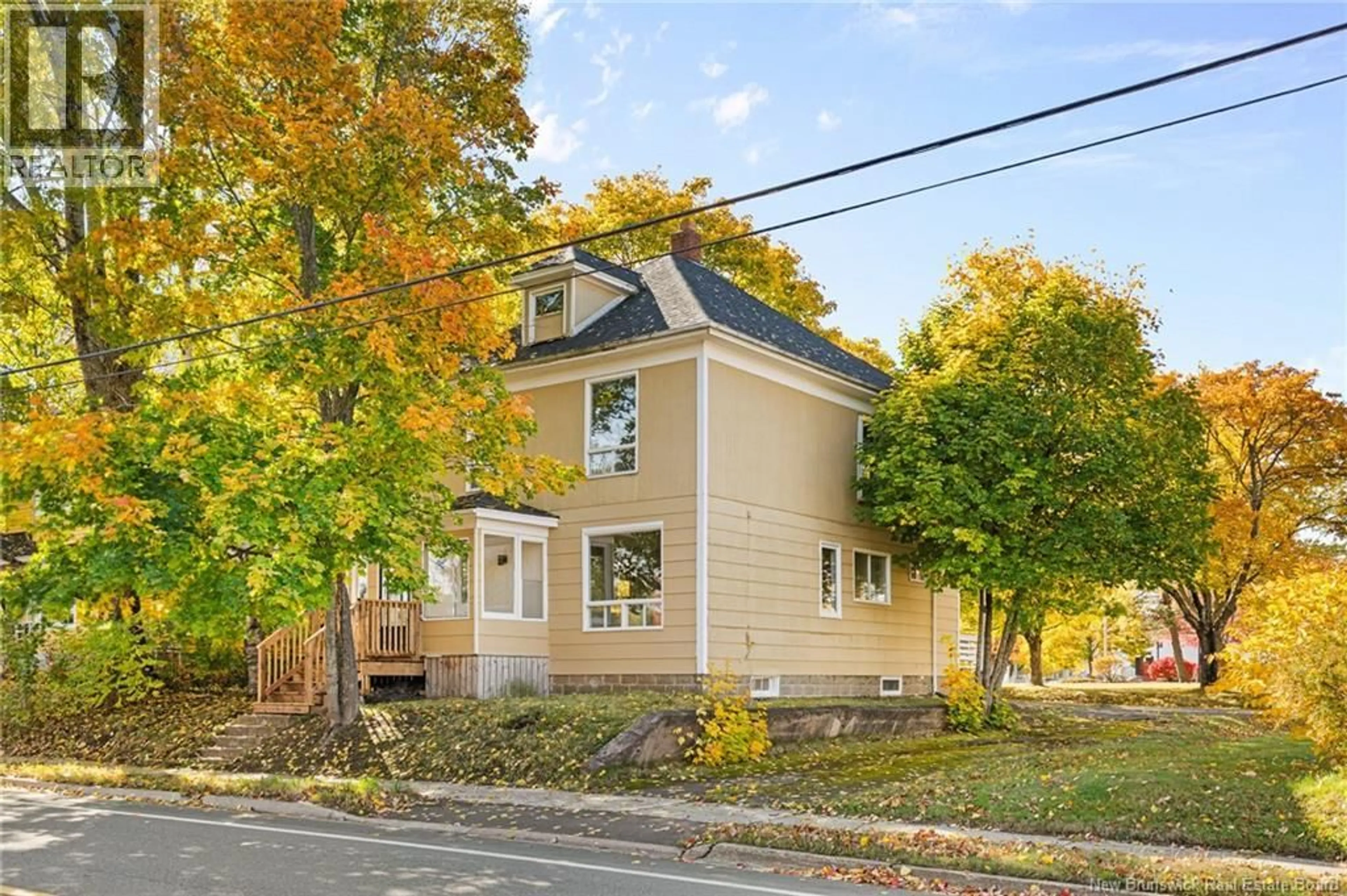 Home with vinyl exterior material, street for 18 MCLAUGHLIN, Moncton New Brunswick E1A4P2