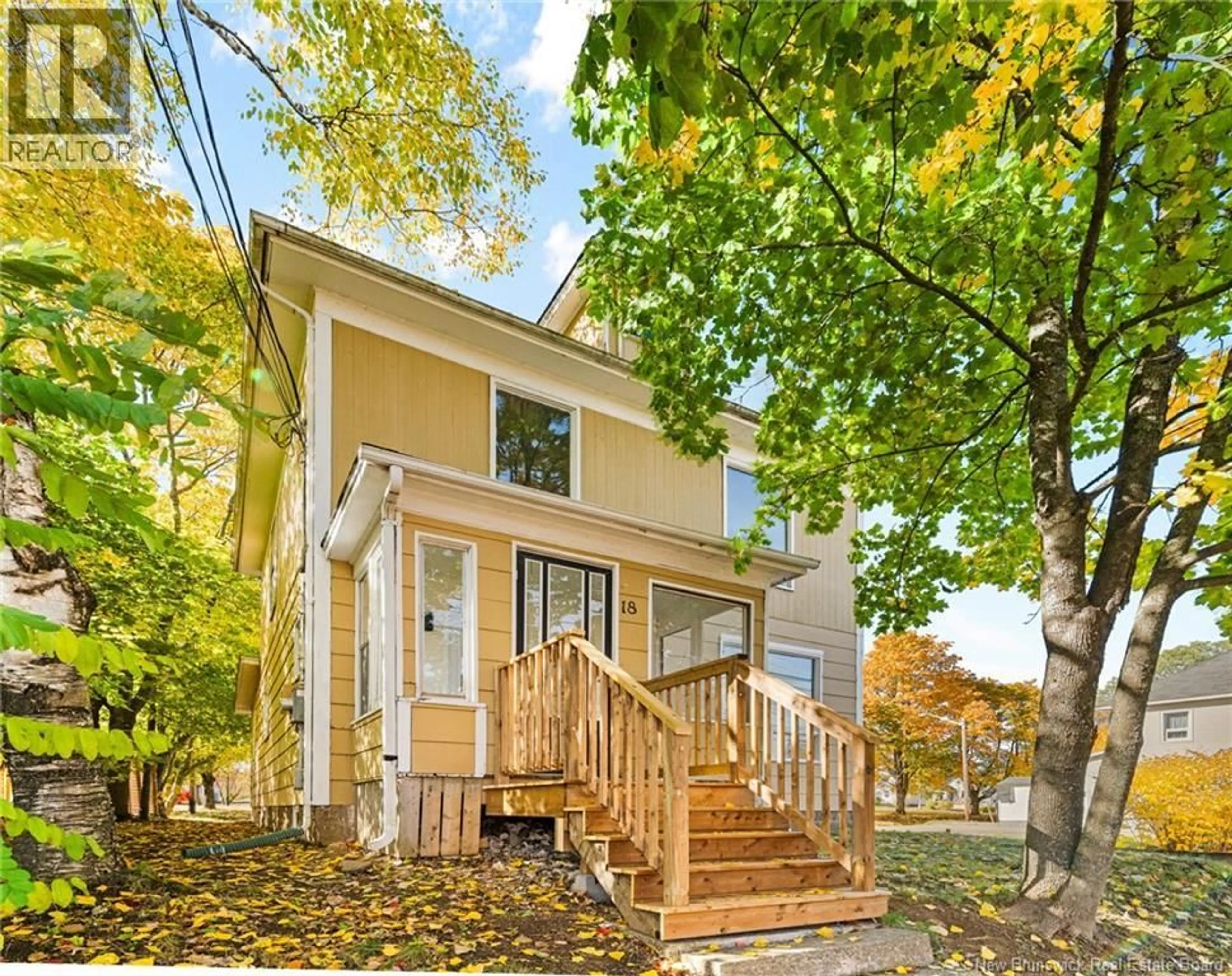 Home with vinyl exterior material, street for 18 MCLAUGHLIN, Moncton New Brunswick E1A4P2