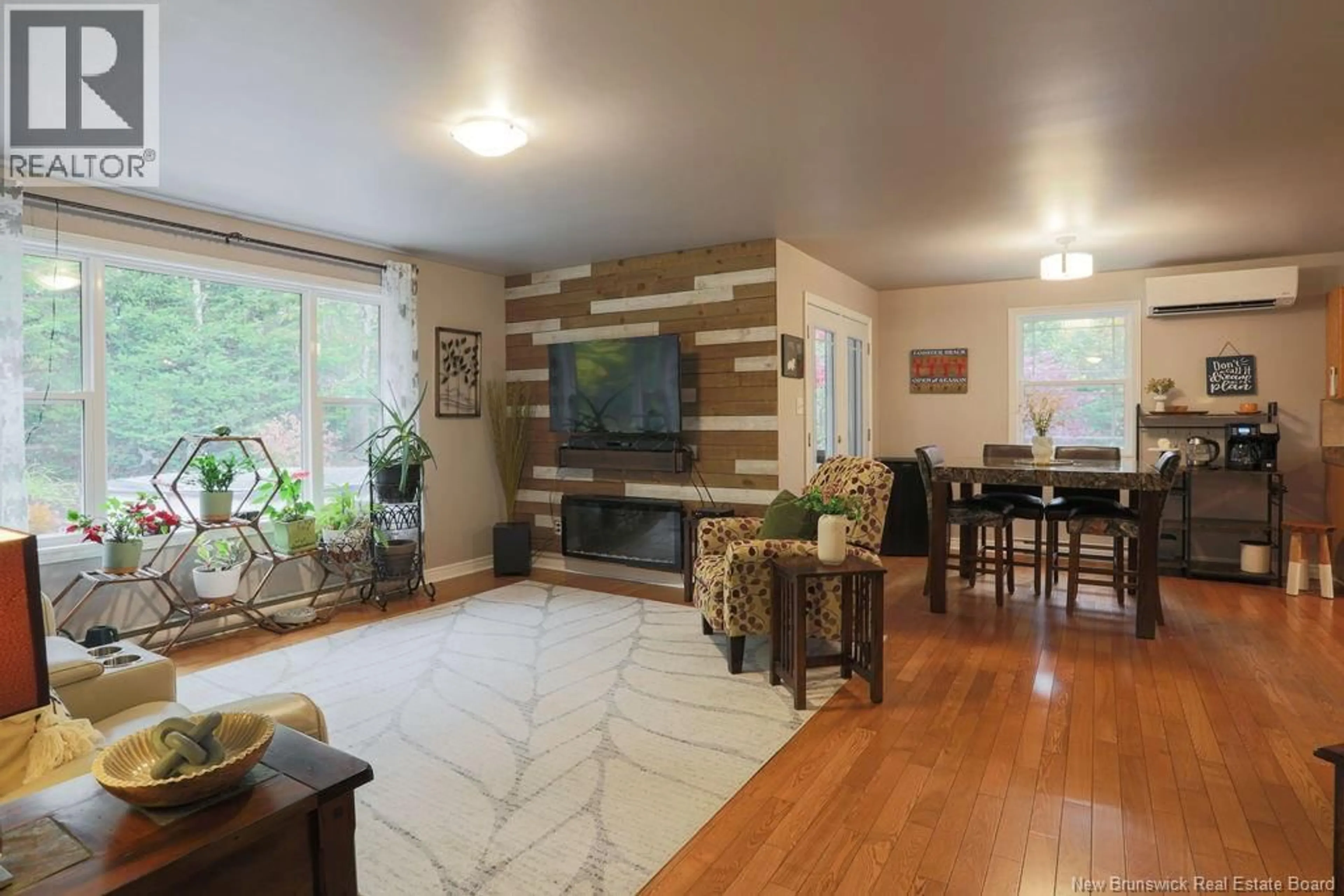 Living room with furniture, wood/laminate floor for 25 SPRING GARDEN ROAD, Saint John New Brunswick E2K1N4
